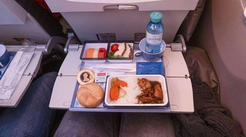 An economy class meal from a second airline, showing the reheated tray format