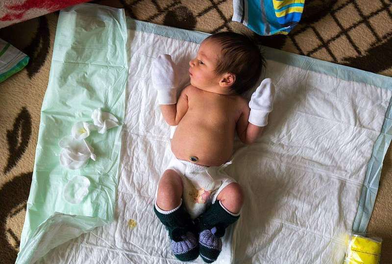 A newborn baby girl resting