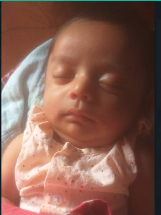 A newborn baby sleeping, when sleep comes in short stretches around the clock