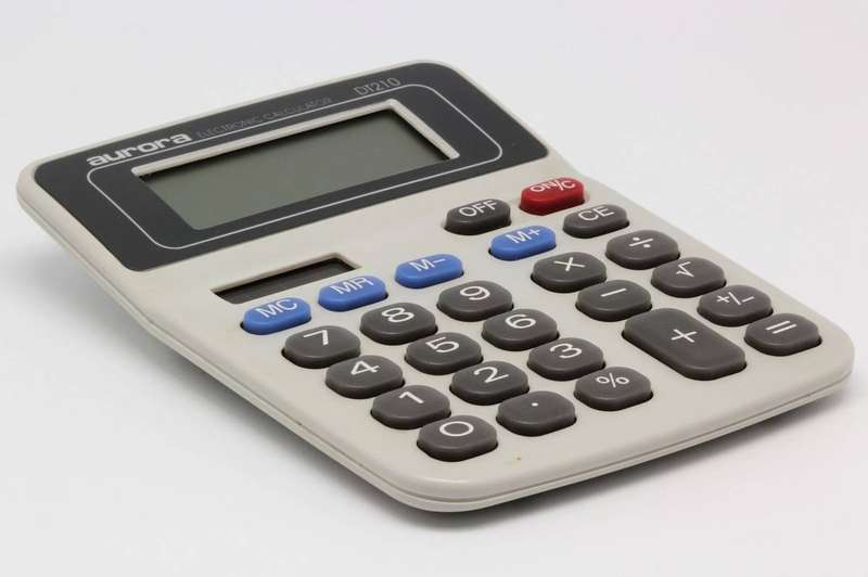 A calculator on a desk, the tool behind every interest estimate