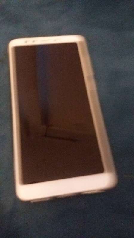 An Android smartphone, on which the factory reset screens and eSIM options vary by manufacturer