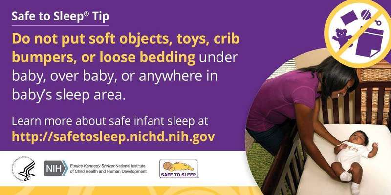 A bare crib set up for safe infant sleep