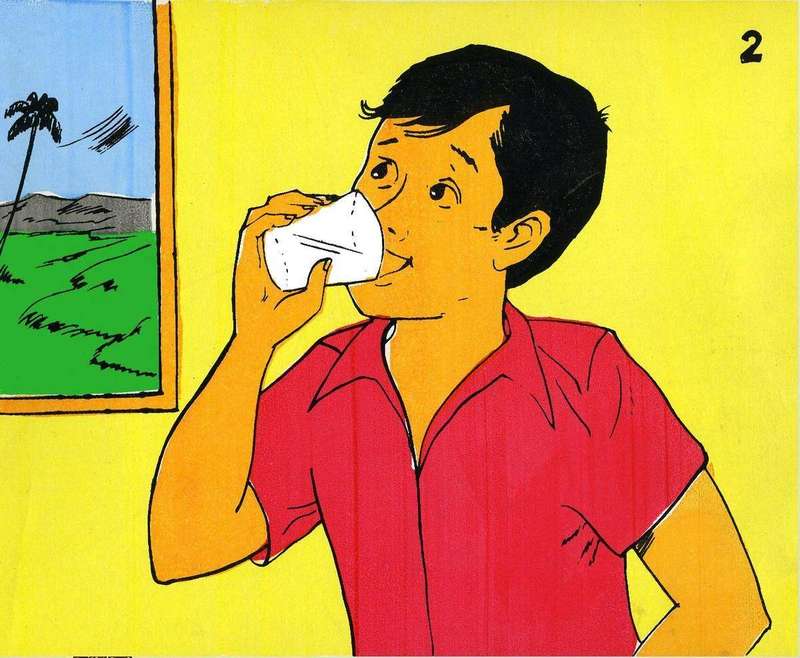 A boy drinks water from a glass at home, illustrating the hydration habit linked to fewer night leg cramps