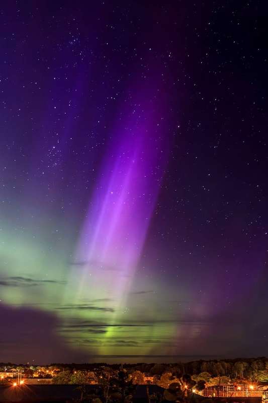 A multicolored aurora pillar over Brastad, Sweden