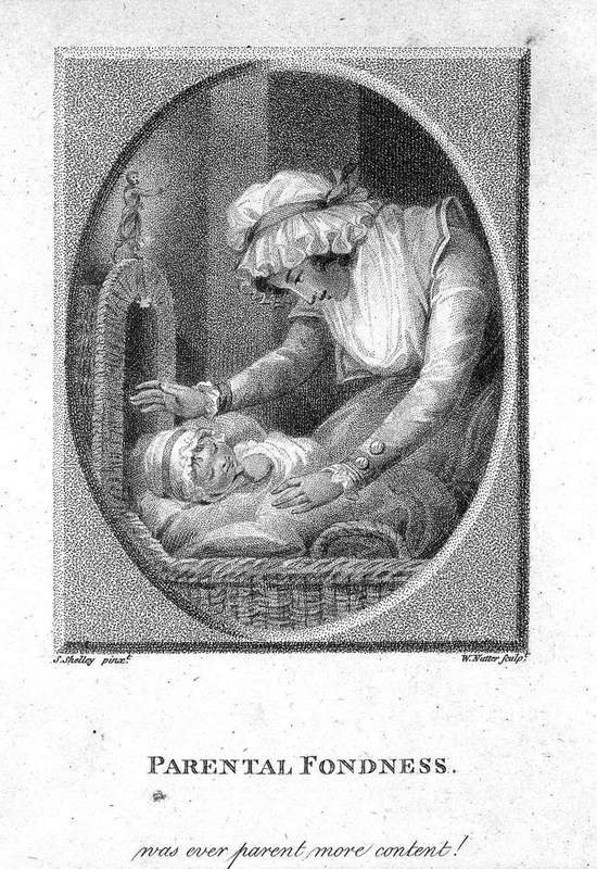 A mother holding her sleeping infant