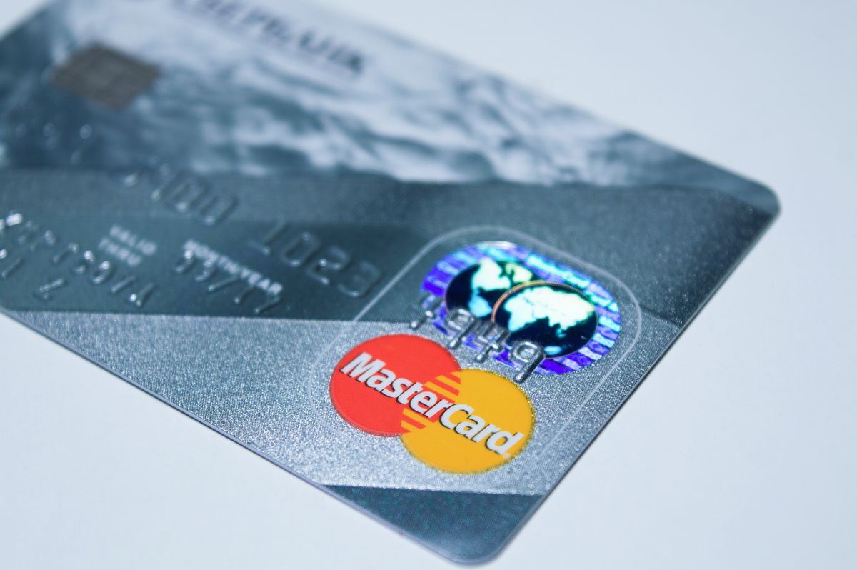 Close-up of a credit card chip and logo, the kind of card used for balance transfers