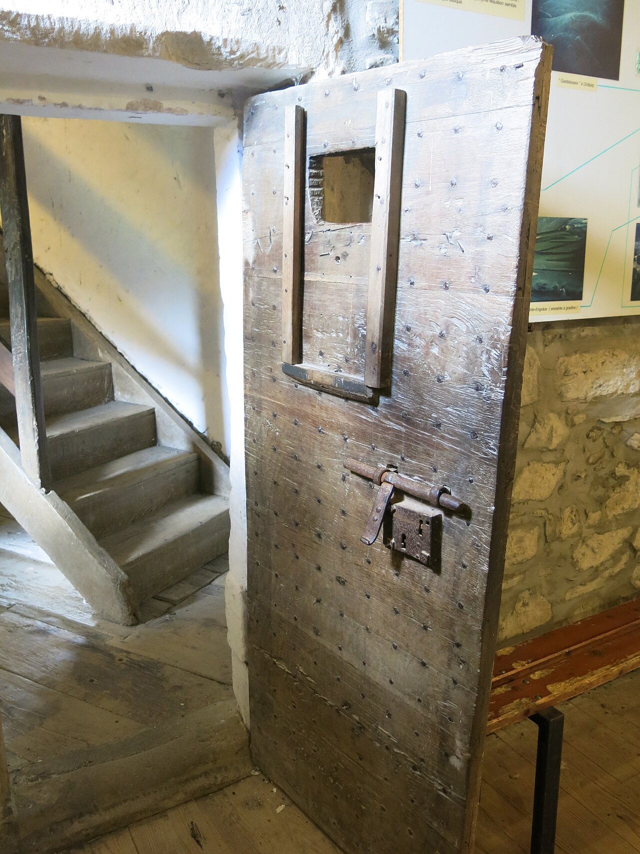 Close view of a wooden door in an old interior