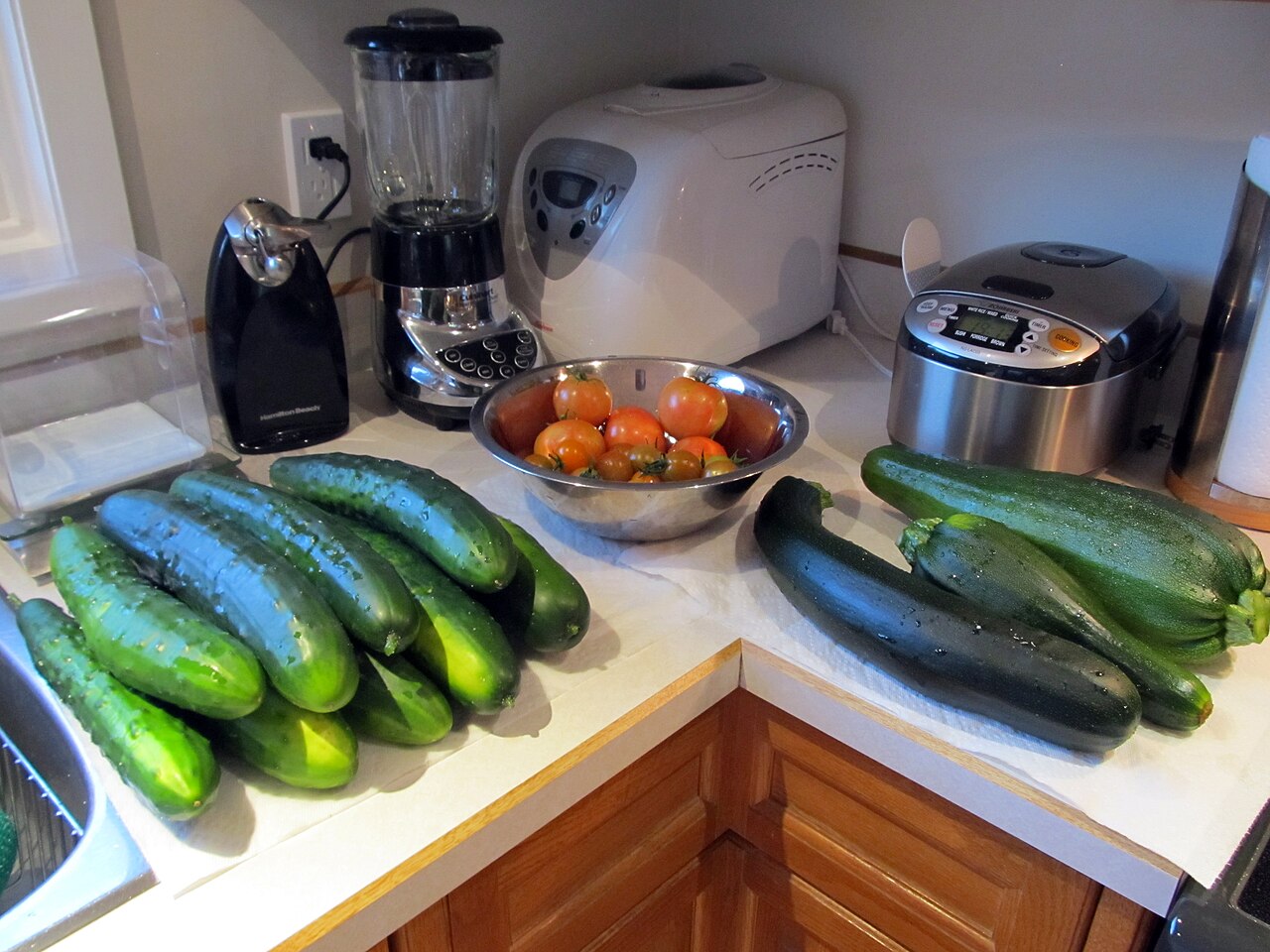 A basket of mixed garden vegetables on a table