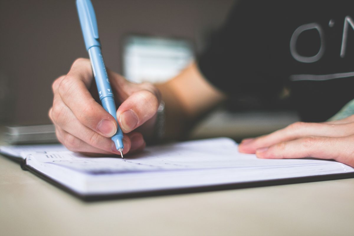 Why do my hands cramp when writing for long periods?