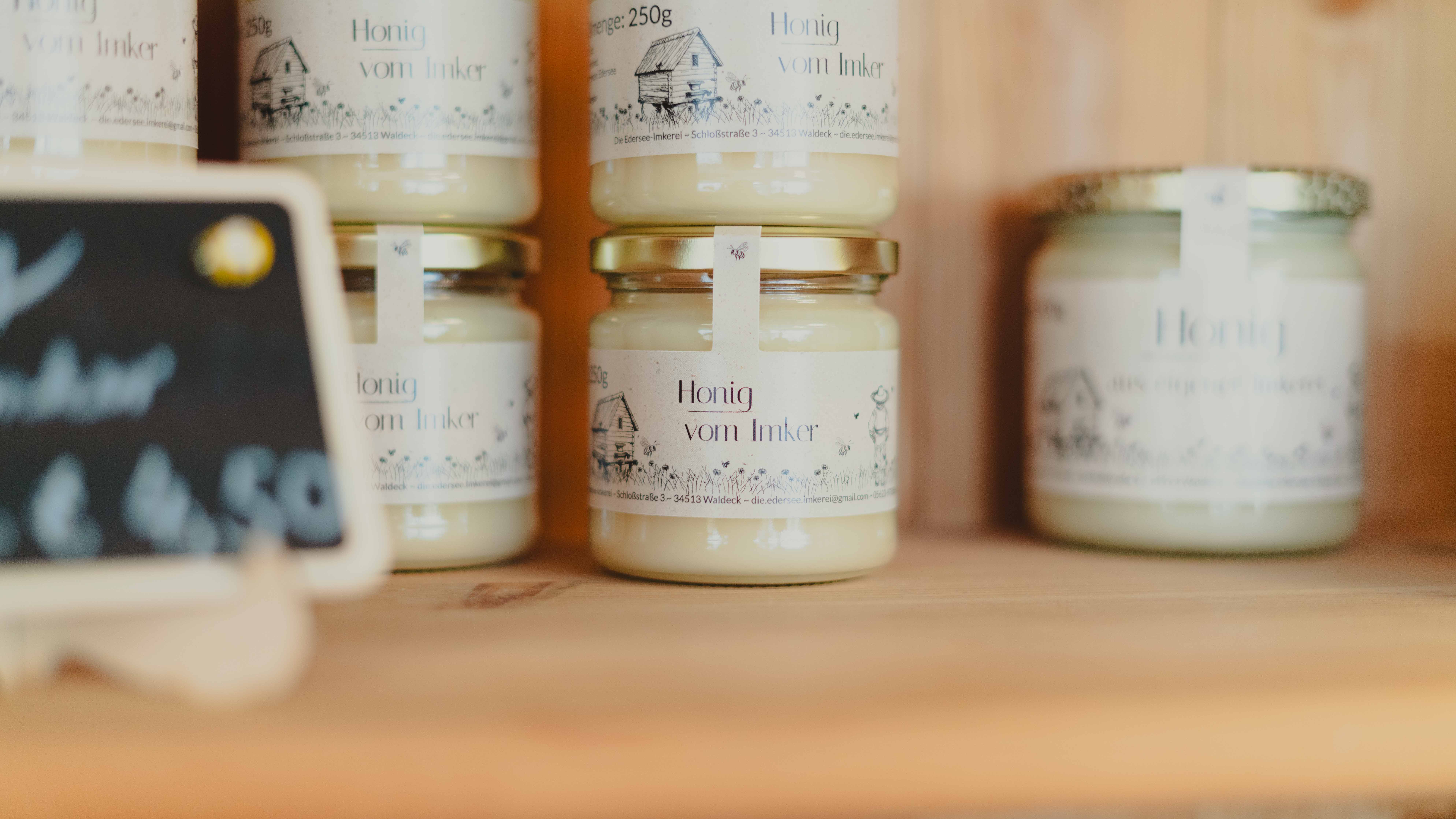 Sealed jars of honey stored at room temperature