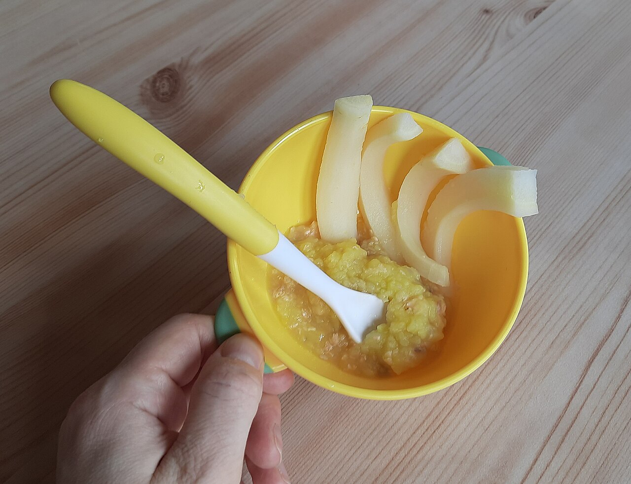 Homemade baby food in a bowl, ready for starting solids