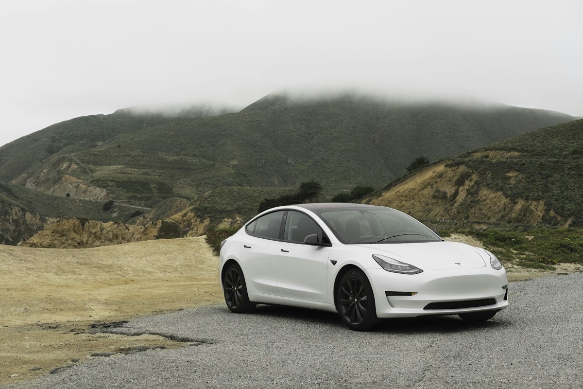 Close view of an electric vehicle being charged