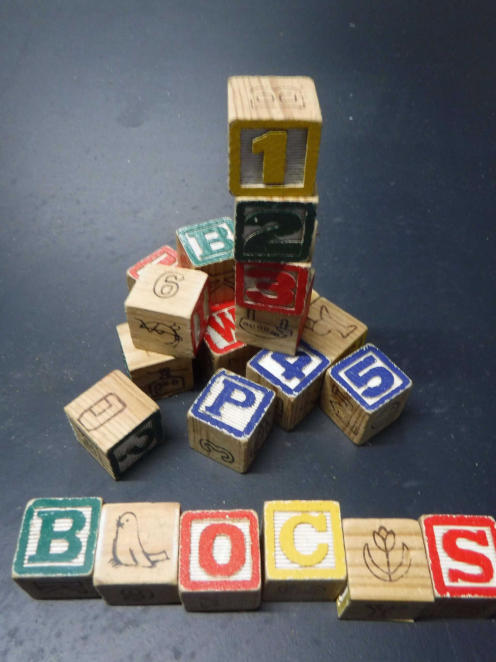 Colorful alphabet blocks, a safe toy for mouthing babies