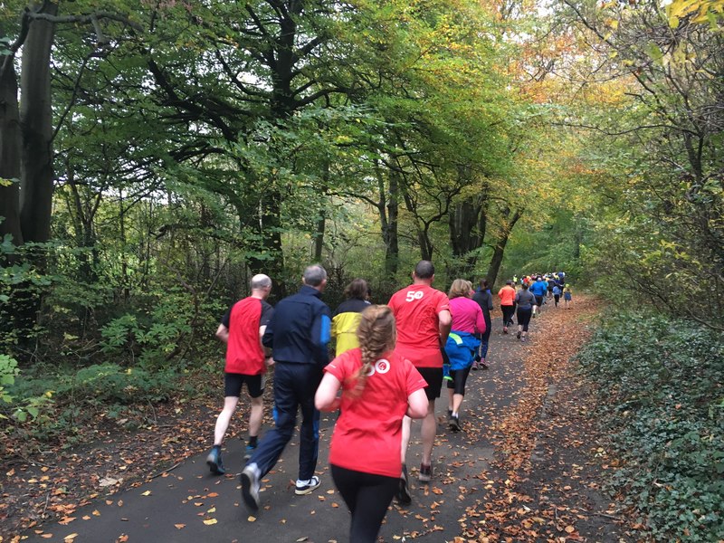 Runners at a weekly parkrun event