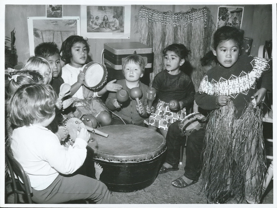 A kindergarten music lesson in 1965, with children seated side by side