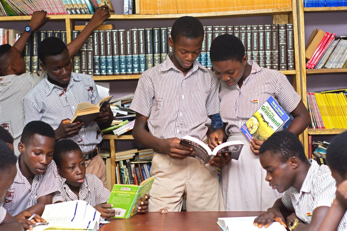 Students studying together in a library