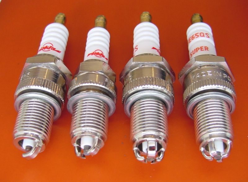 A close-up of spark plugs, the most common cause of hesitation under acceleration
