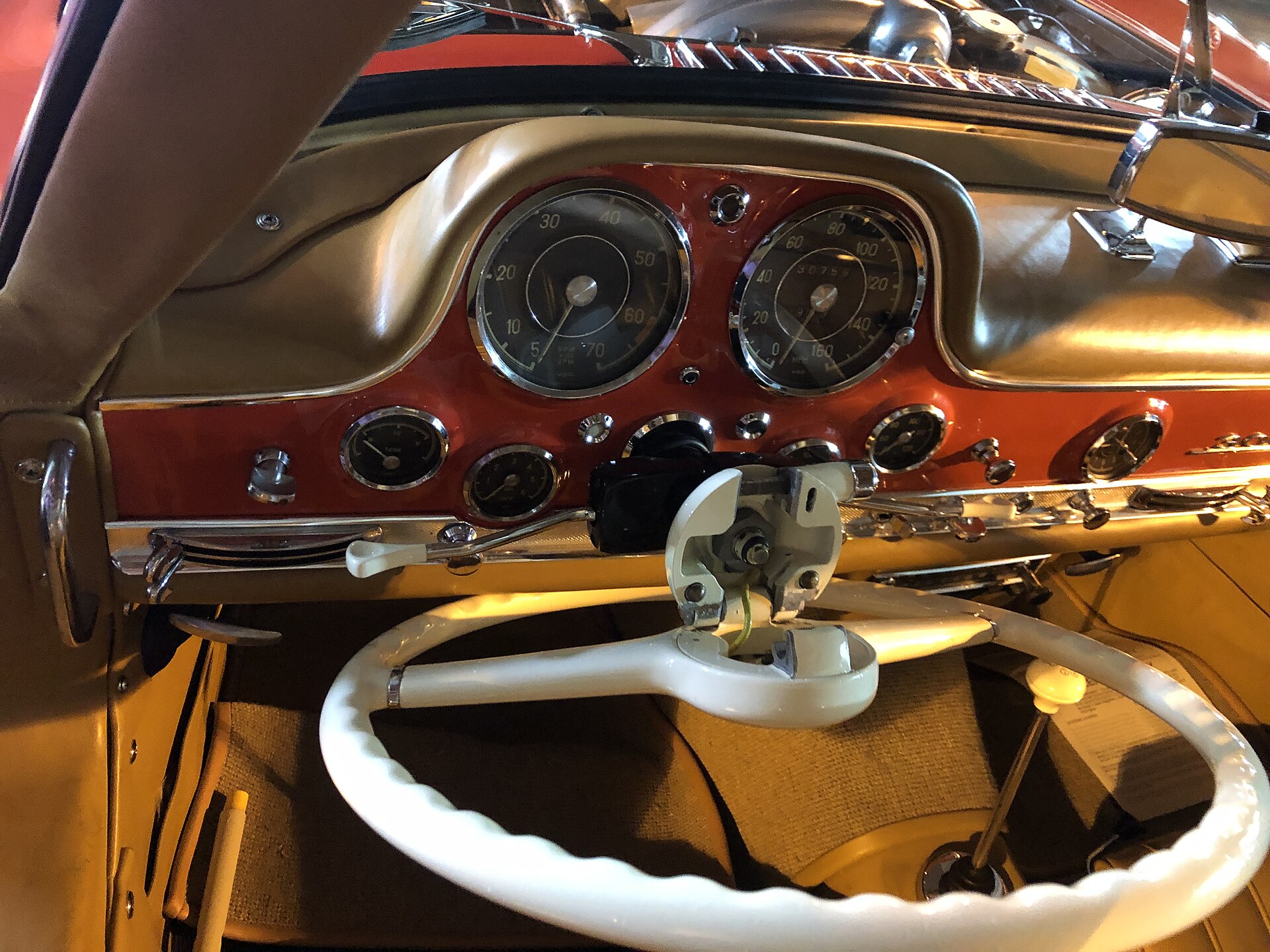 The steering wheel of a classic Mercedes 300 SL