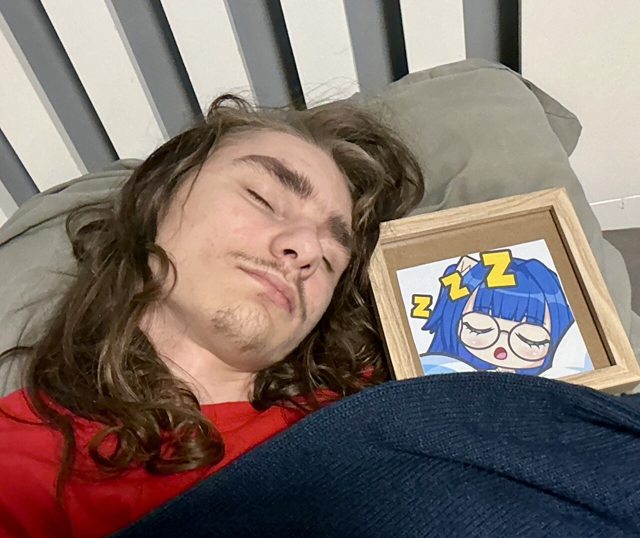 A man sleeping in bed