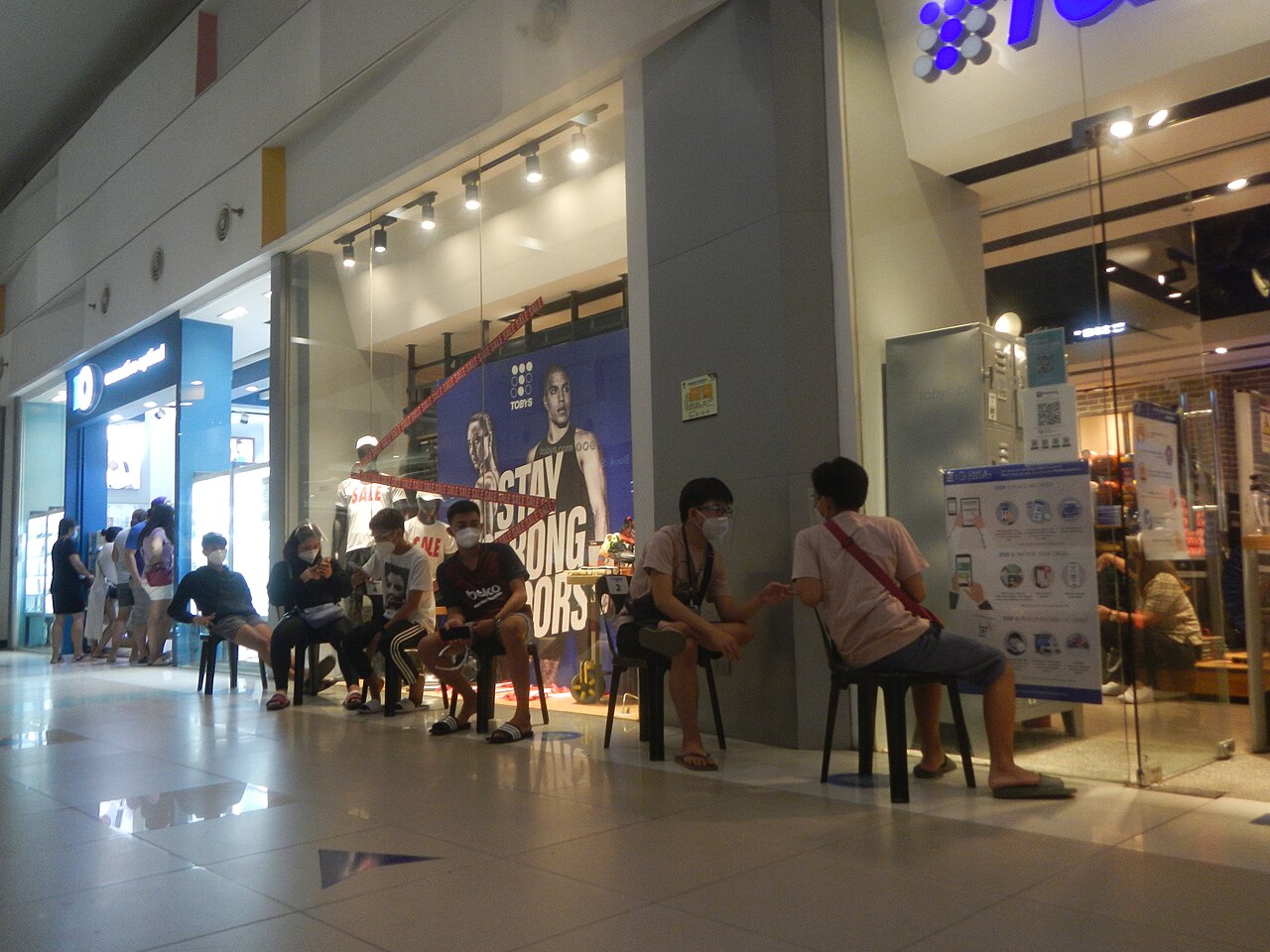 A person sitting with legs crossed, the classic position that compresses leg nerves