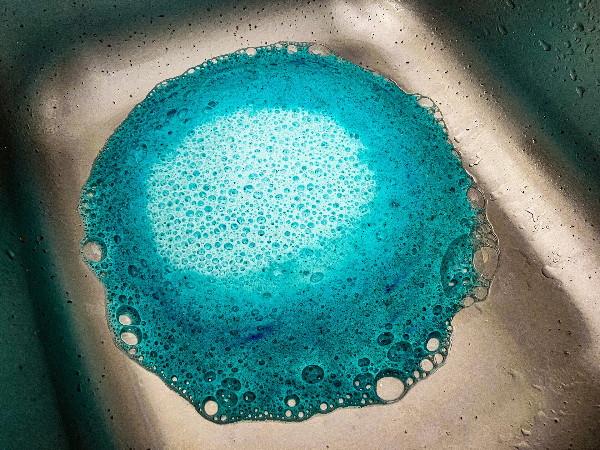 Cleaning foam inside a garbage disposal unit