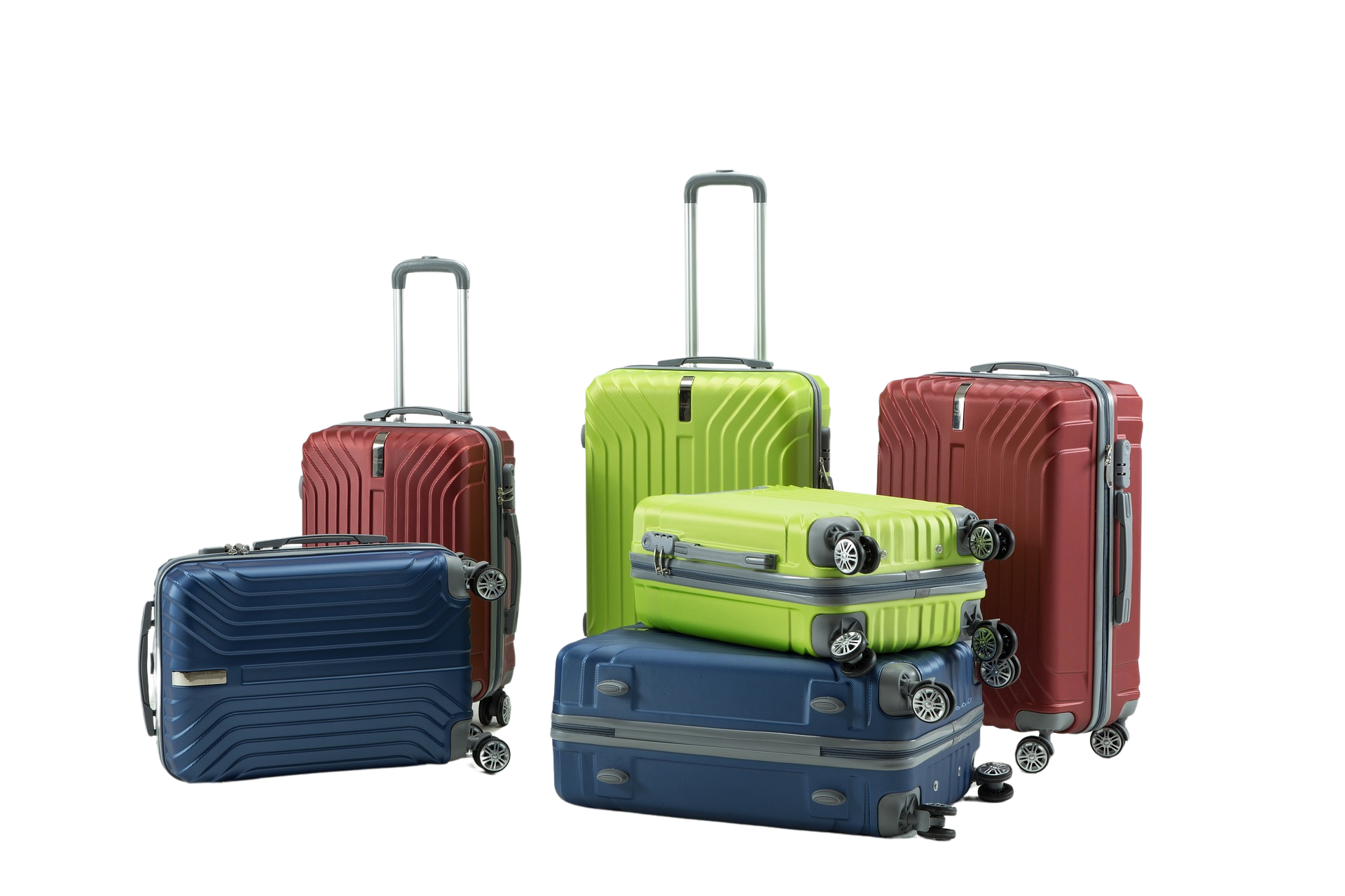 A set of colorful hard-shell suitcases on a dark background