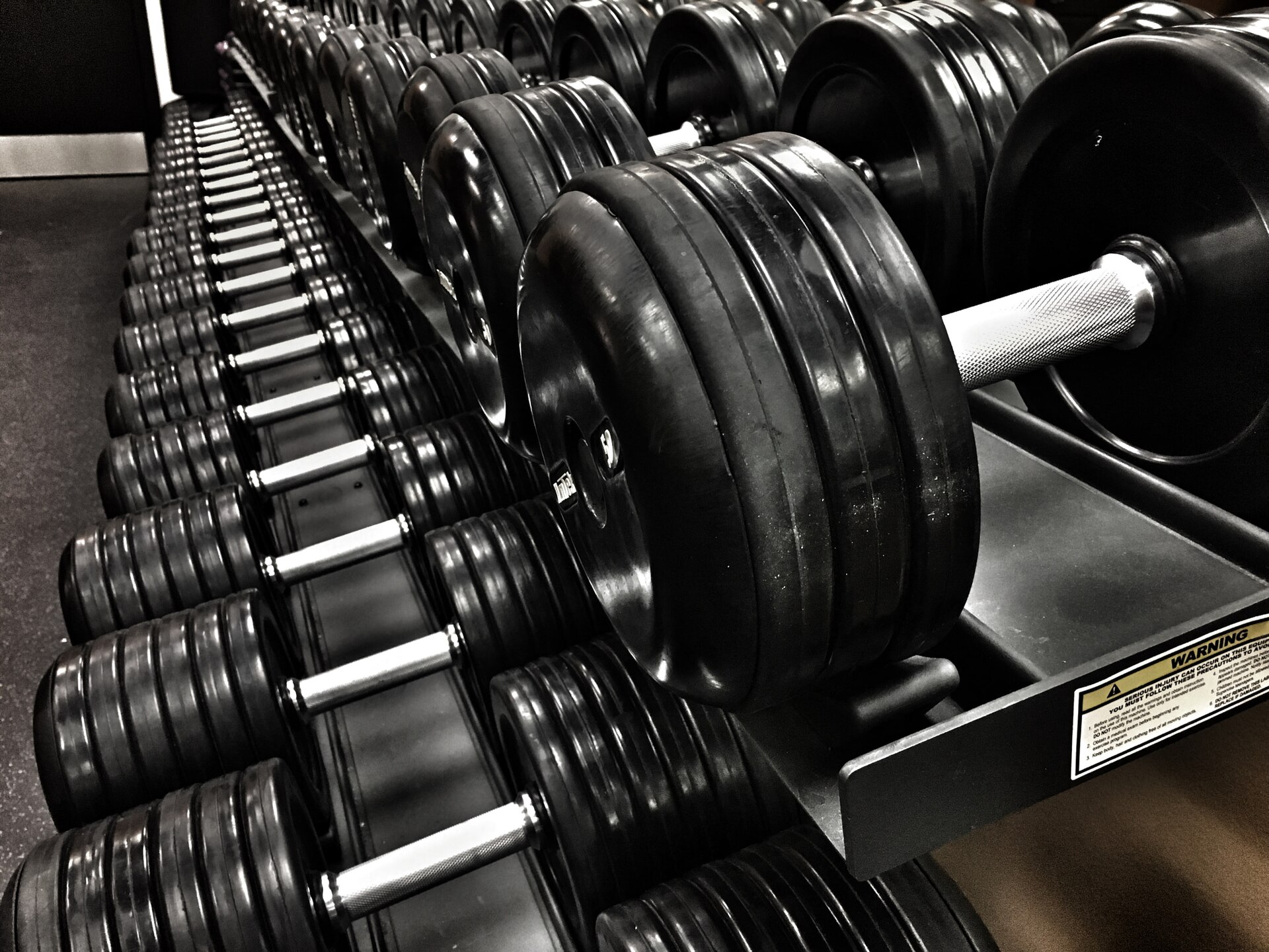 A rack of dumbbells in a gym