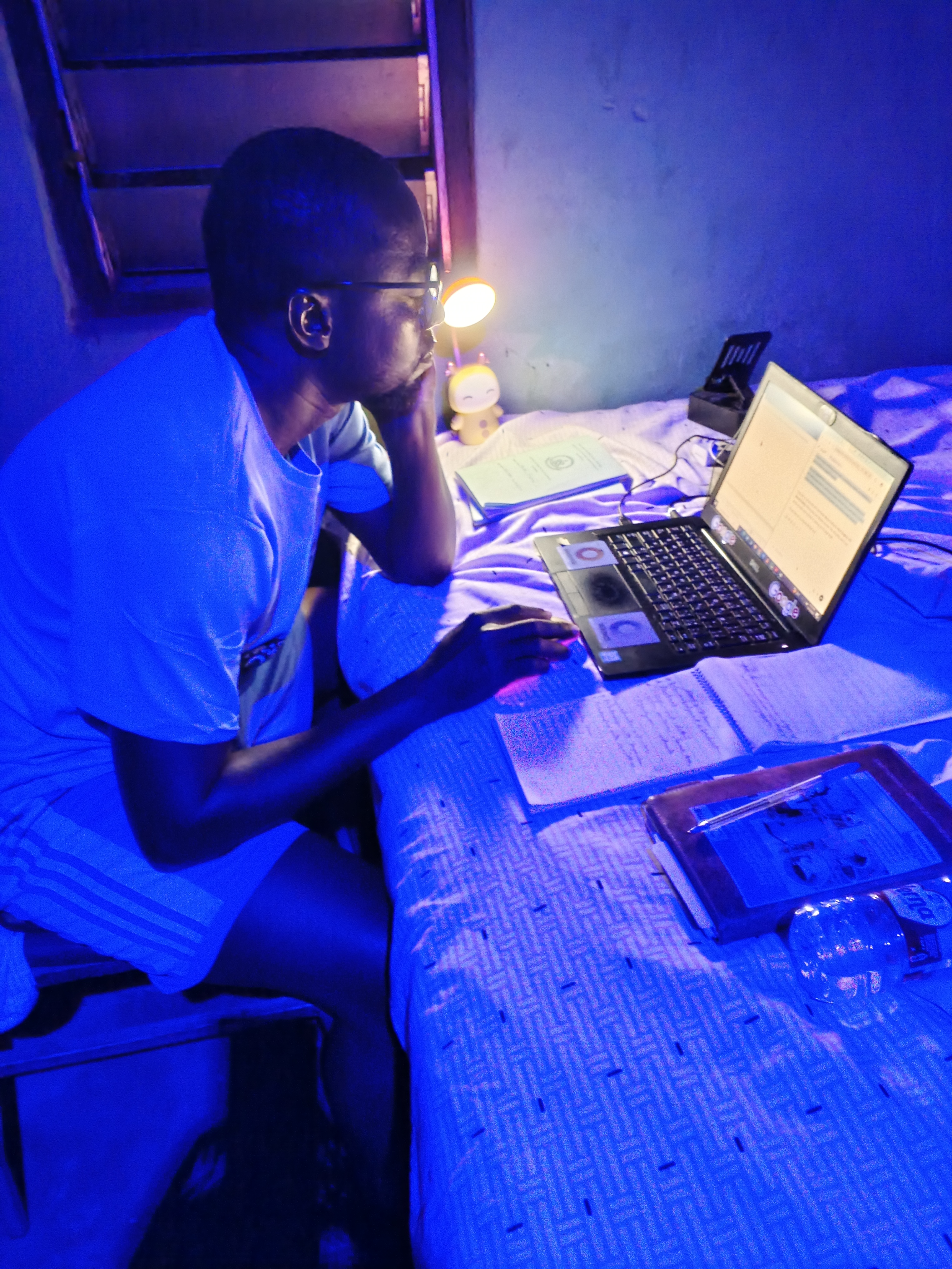 A student studying late at night, the kind of scene behind many all-nighters