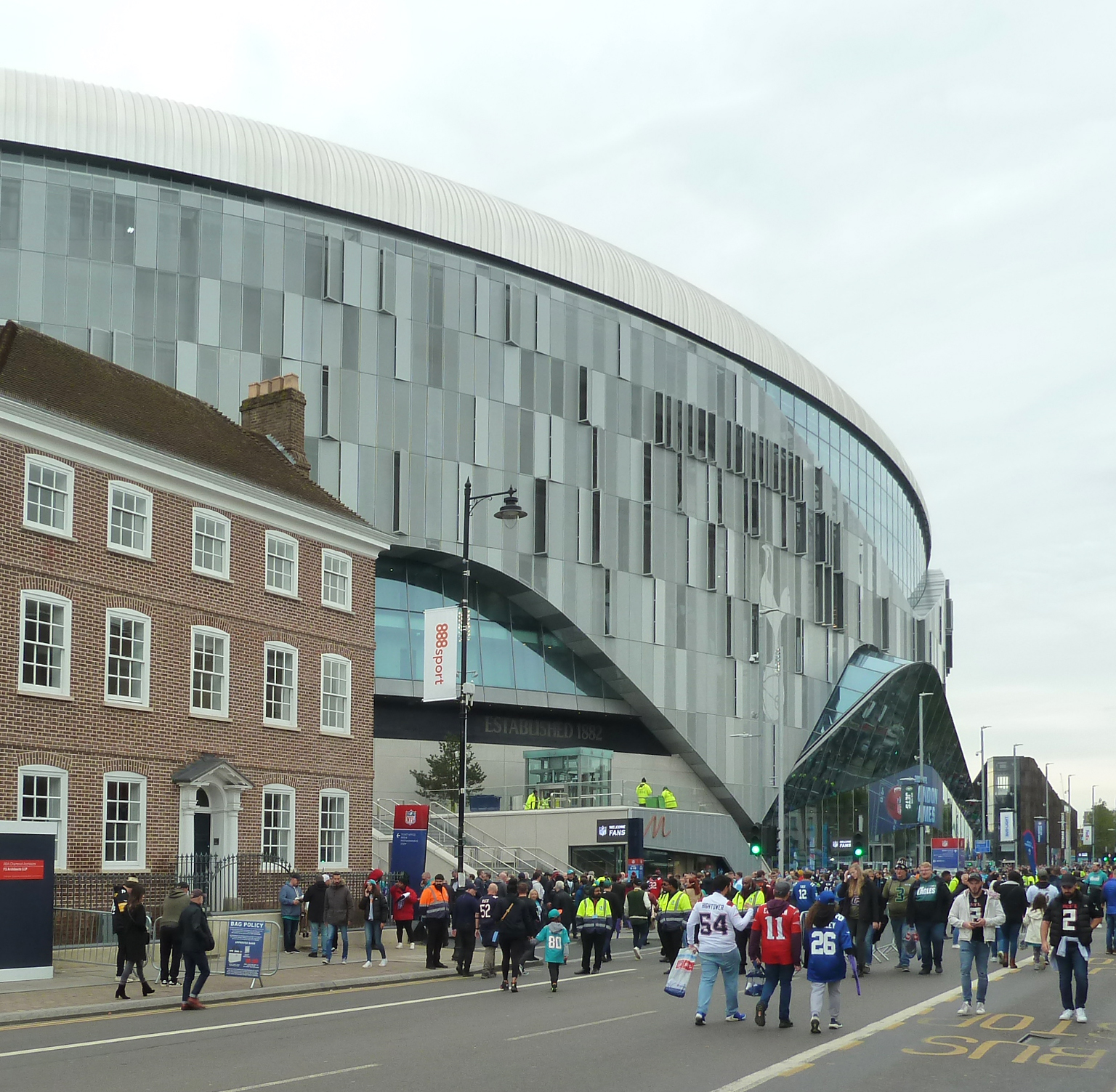 Fans arriving at a stadium for an NFL game