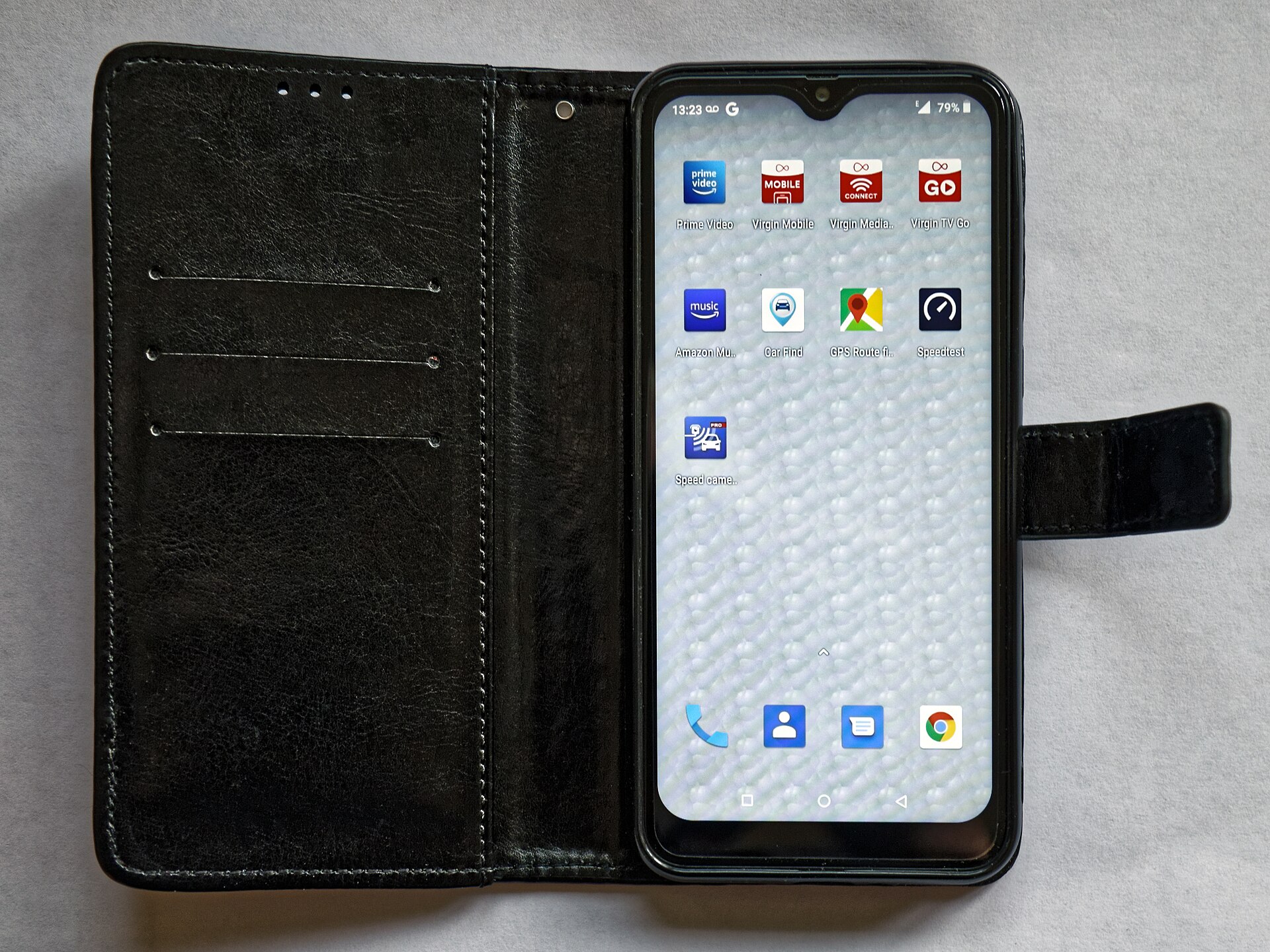 A Blackview A60 Android smartphone in a folio case