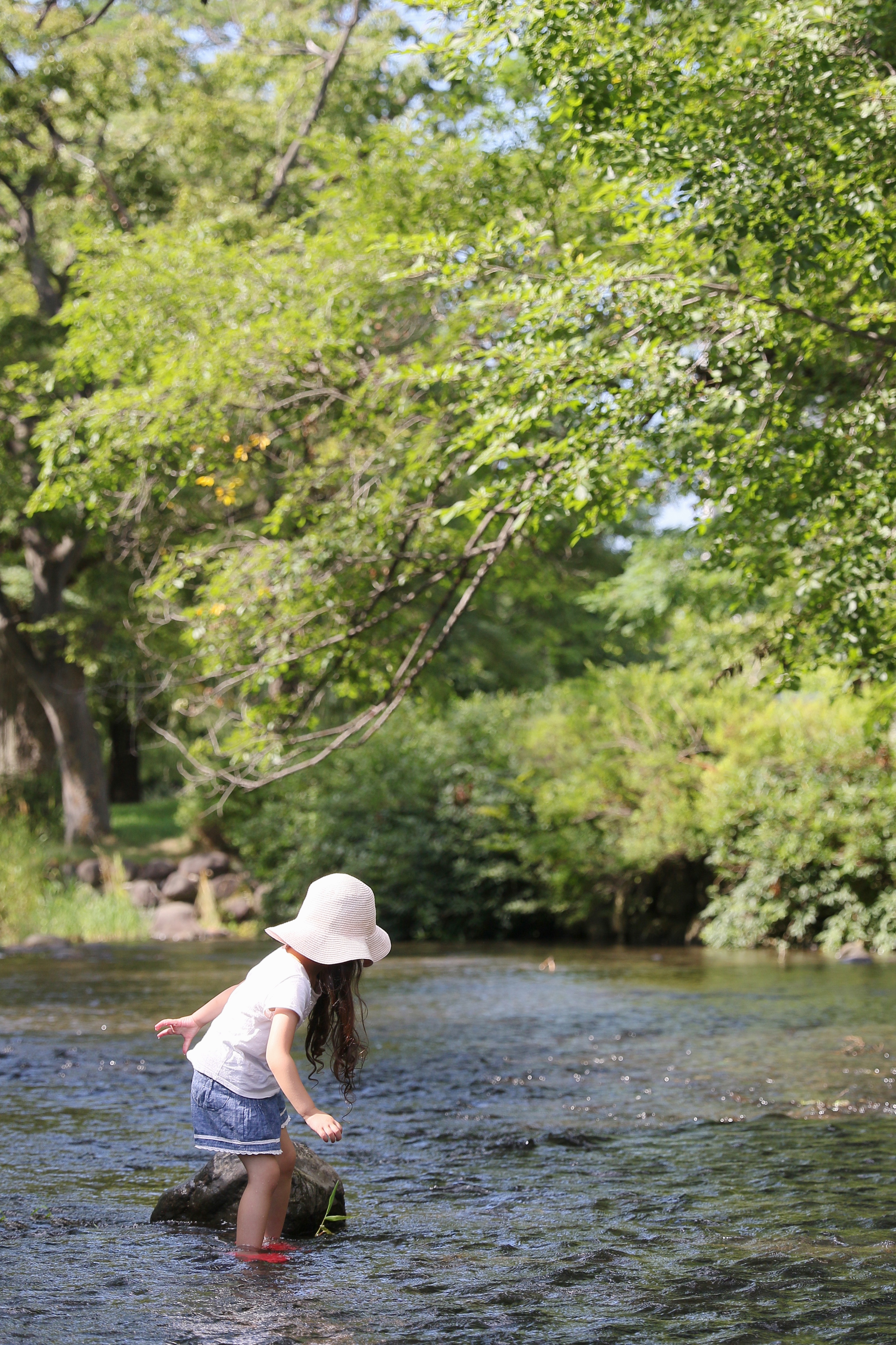 A toddler playing outdoors