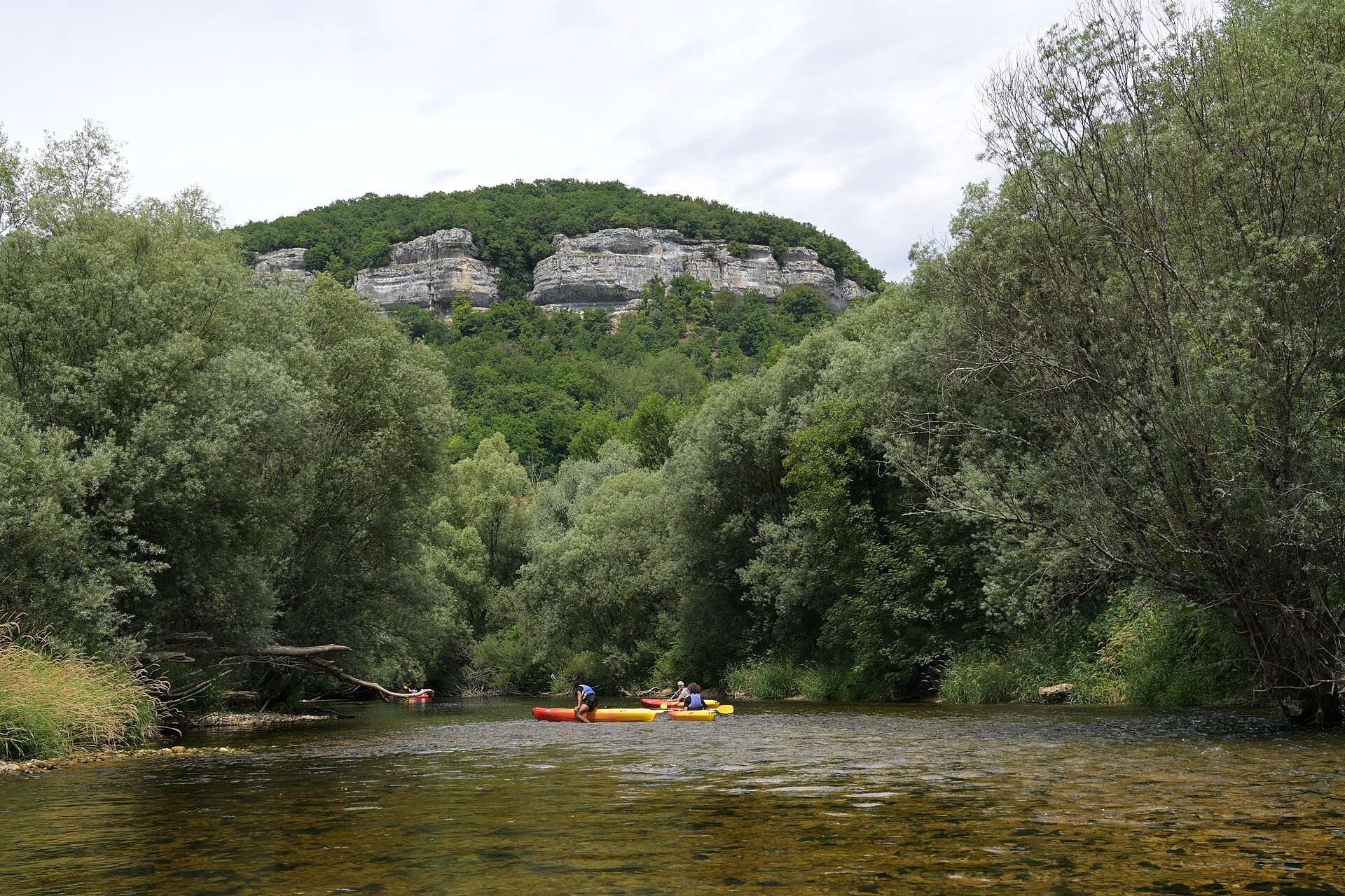 A kayaker in whitewater on a river