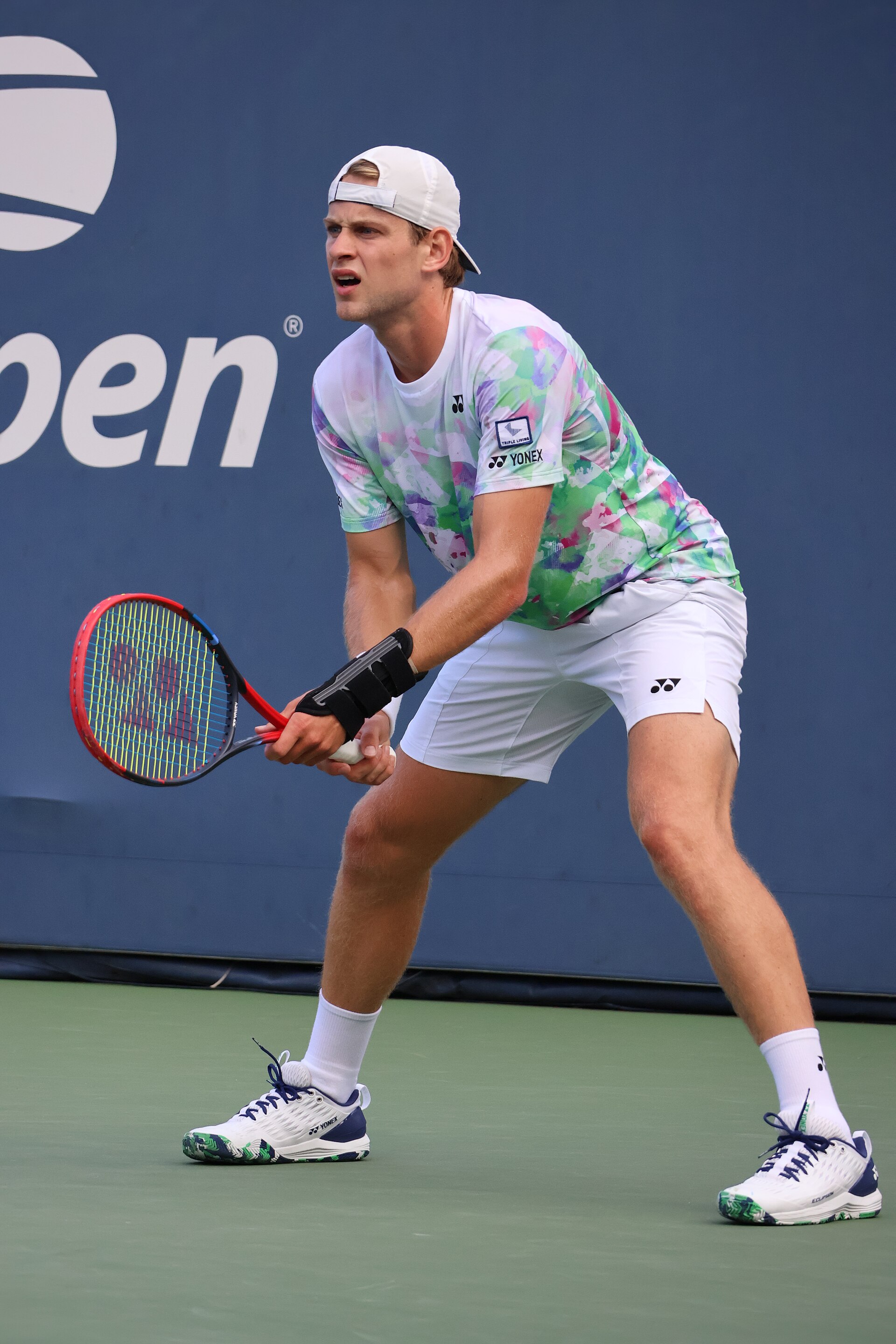 Zizou Bergs playing tennis at the US Open