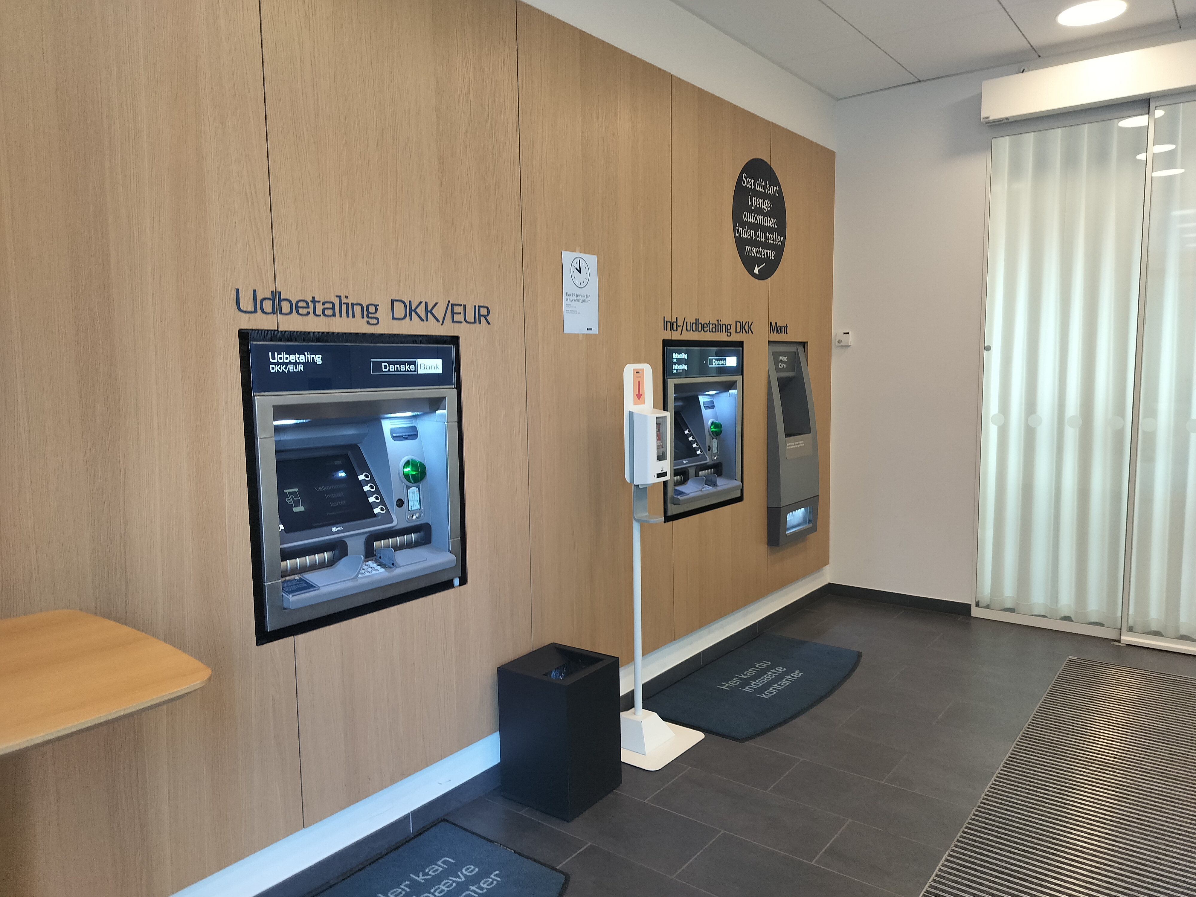 An ATM inside a bank lobby
