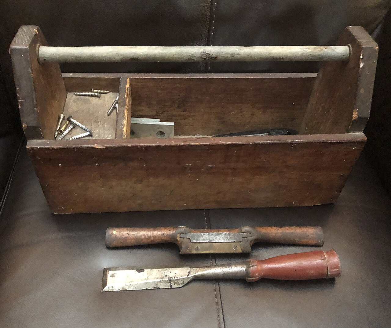 A toolbox with hand tools