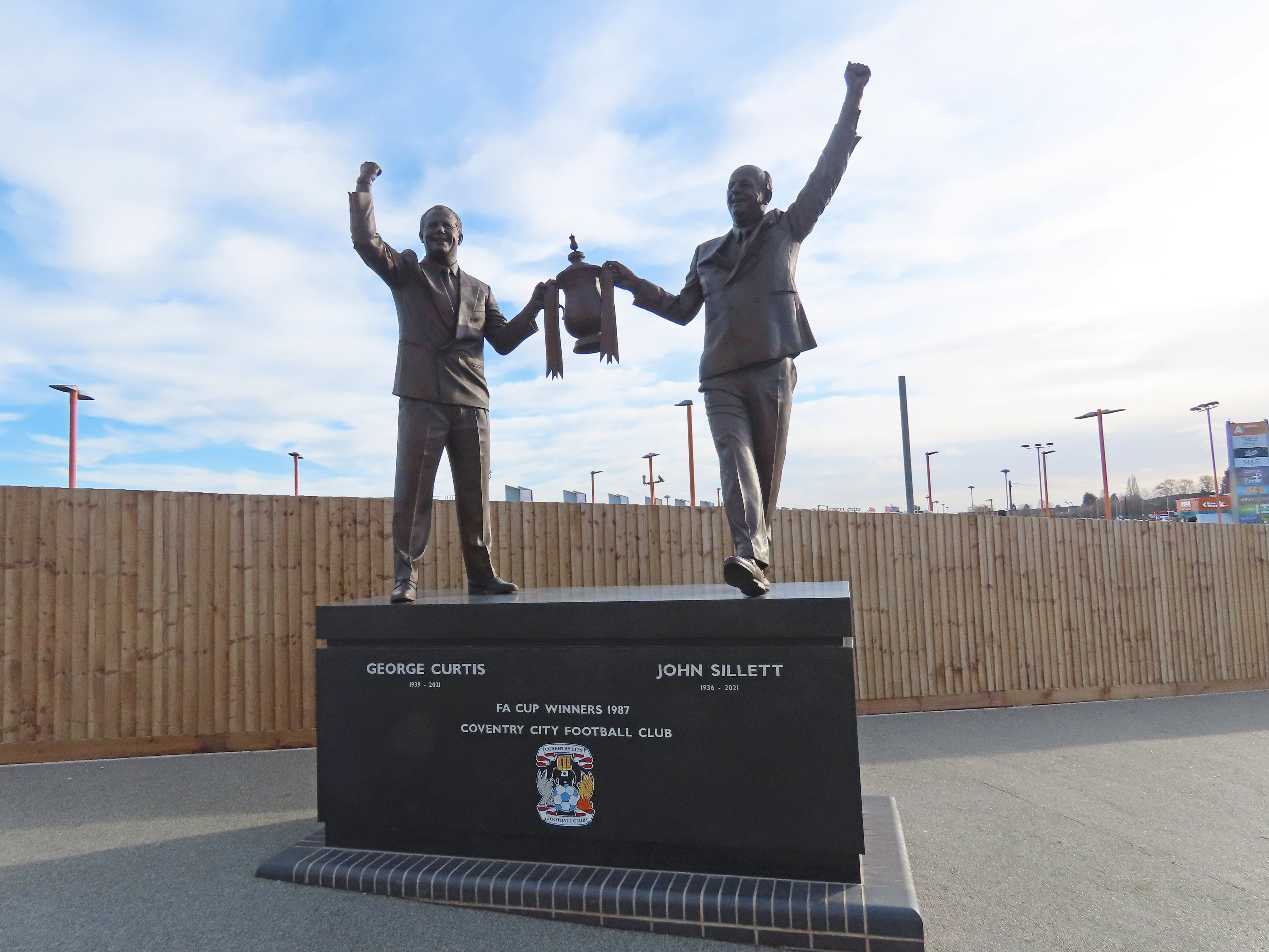 Statues of George Curtis and John Sillett outside the Coventry Building Society Arena