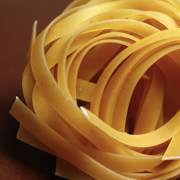 Nests of dry tagliatelle pasta ready for the pantry