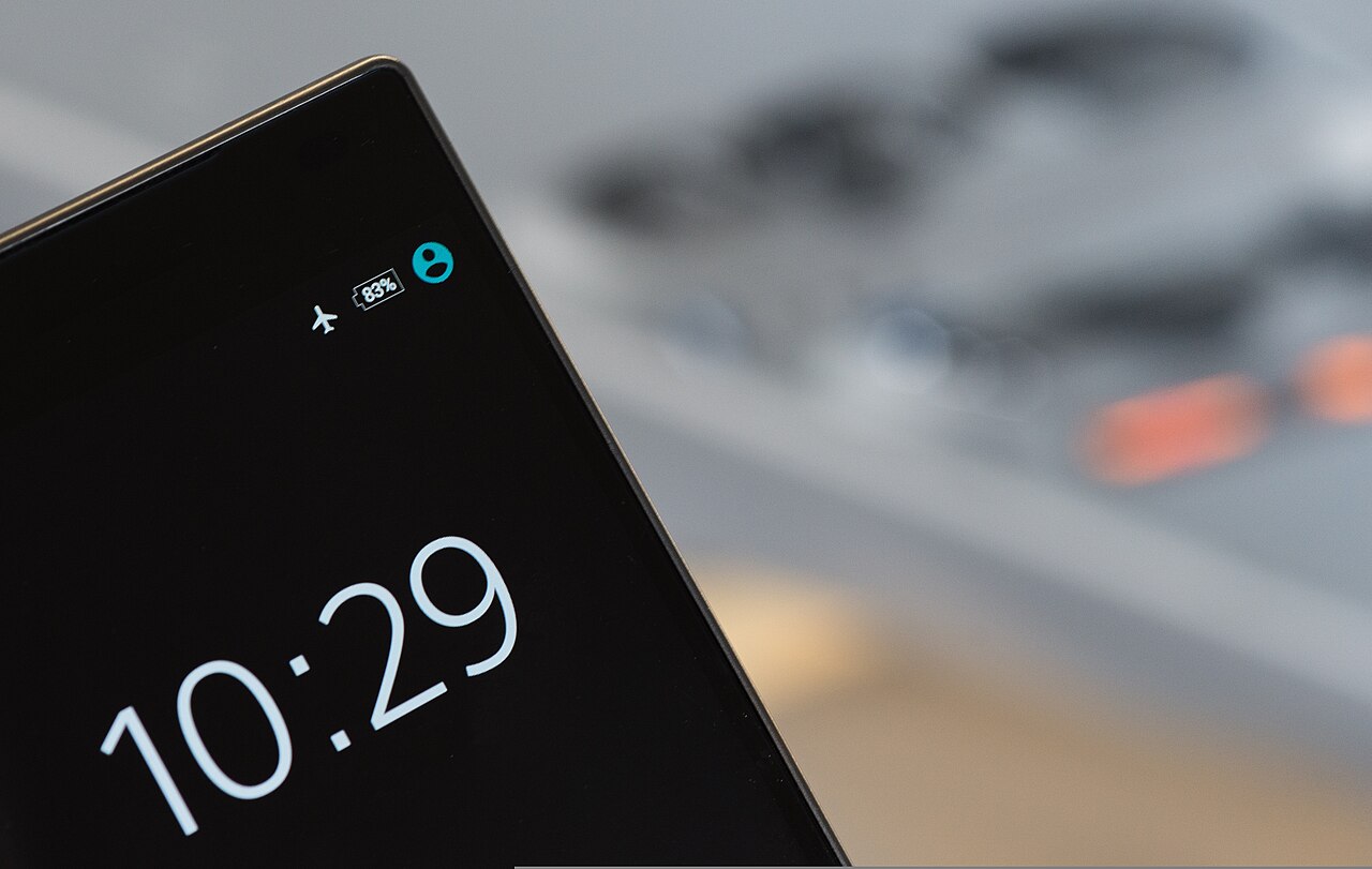 Close-up of a smartphone status bar showing the airplane mode icon switched on