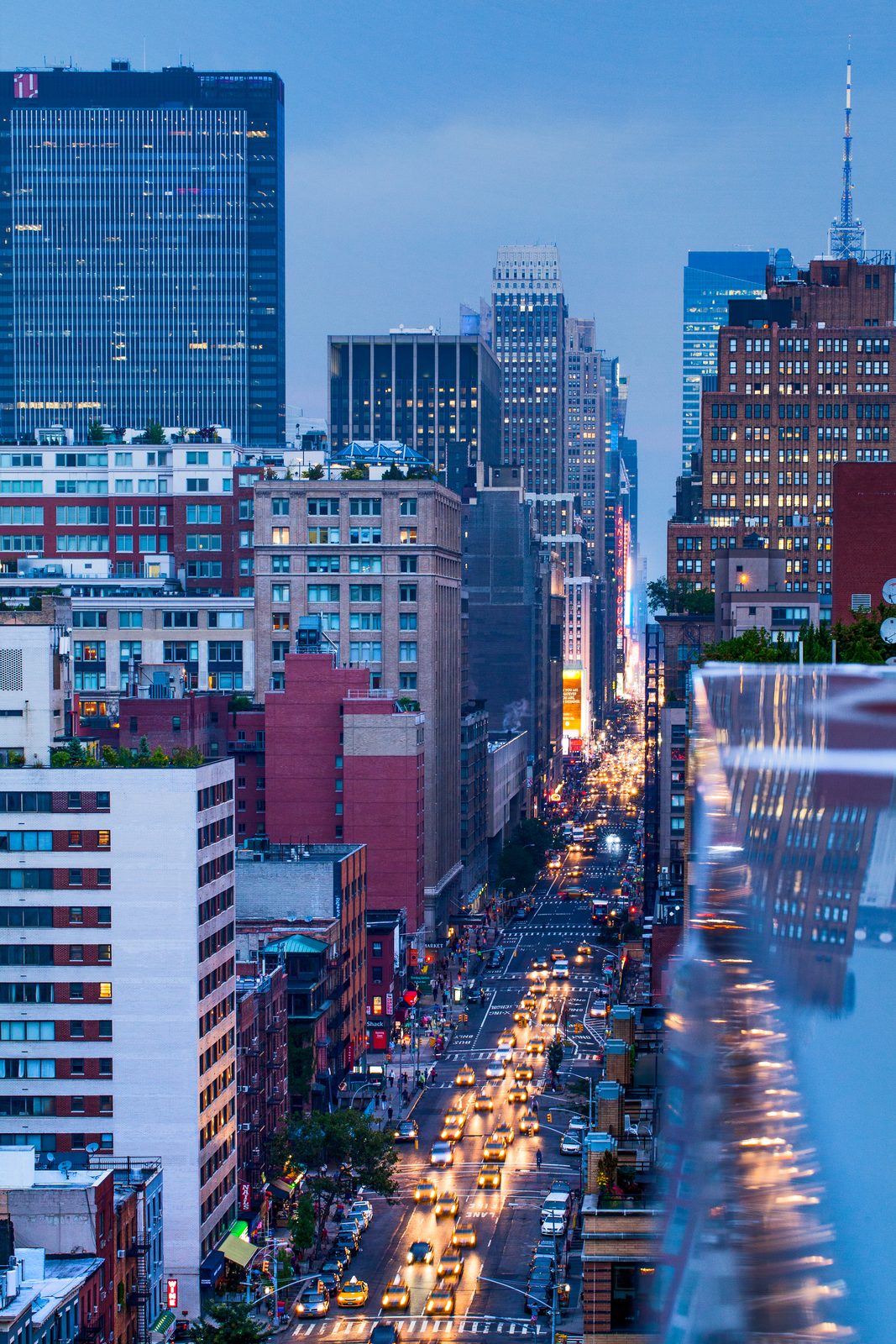 A busy road at night with car lights