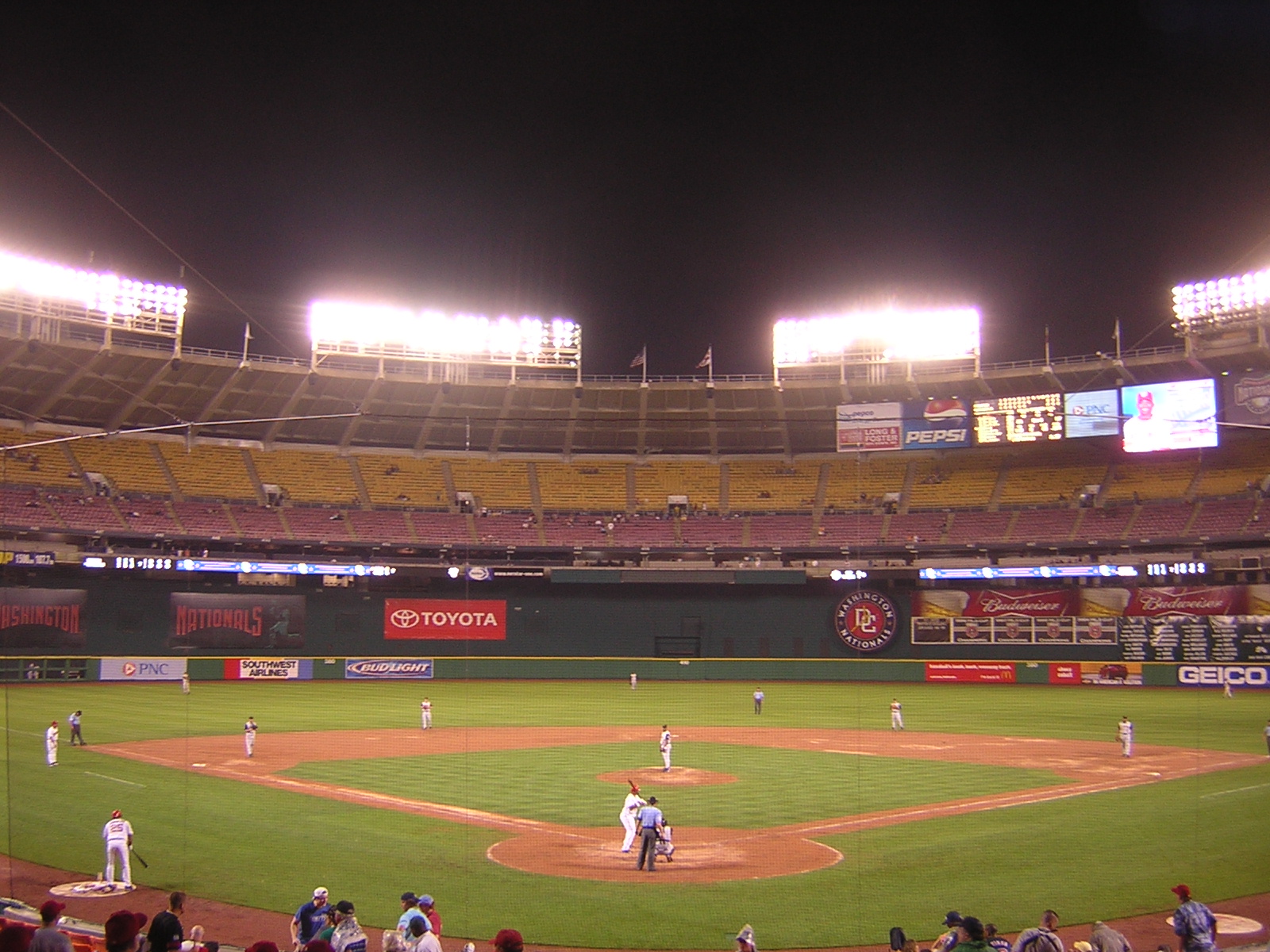 A baseball field seen from the stands on a clear day