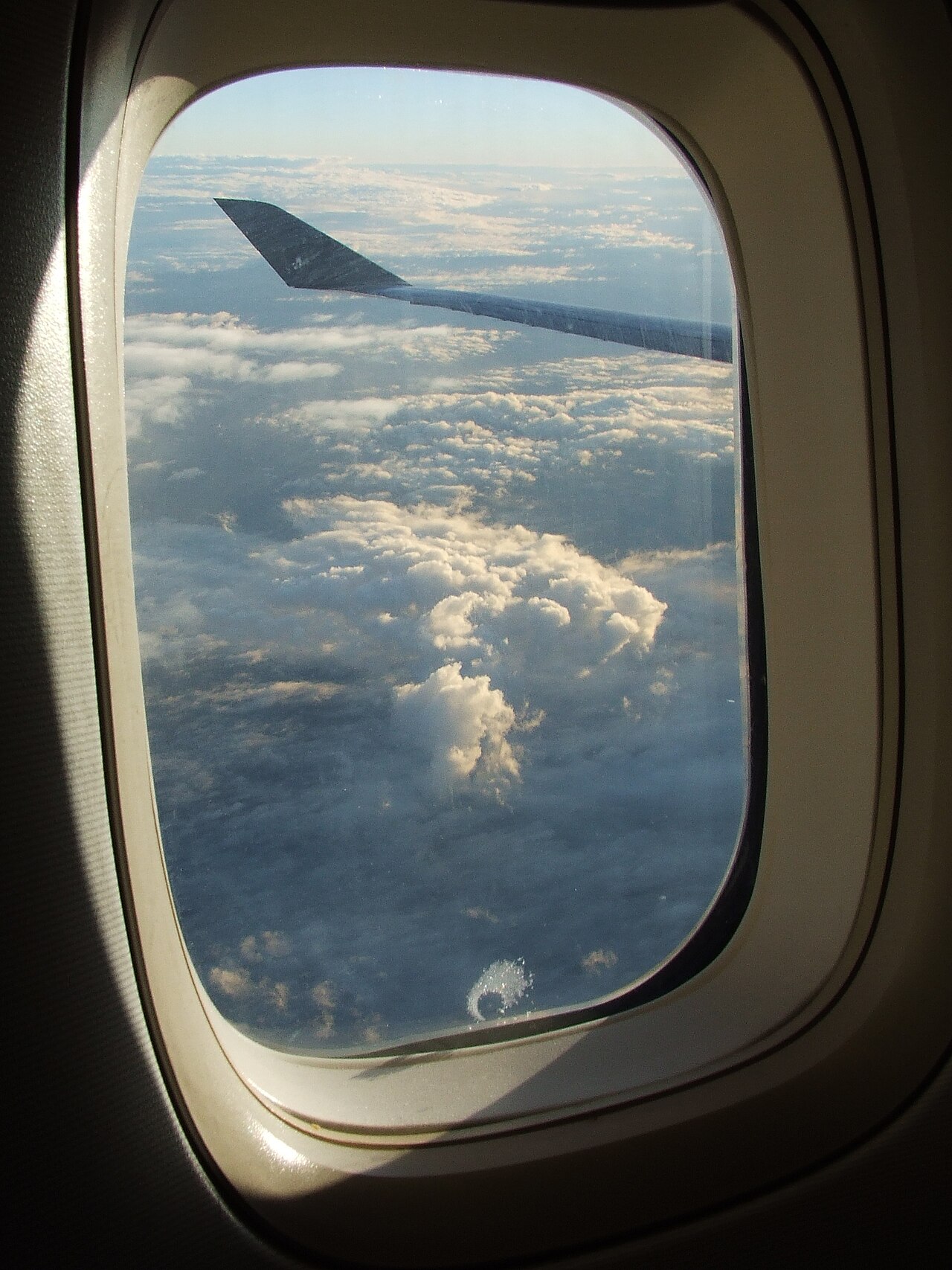 Close view of a Boeing 747 wingtip in flight