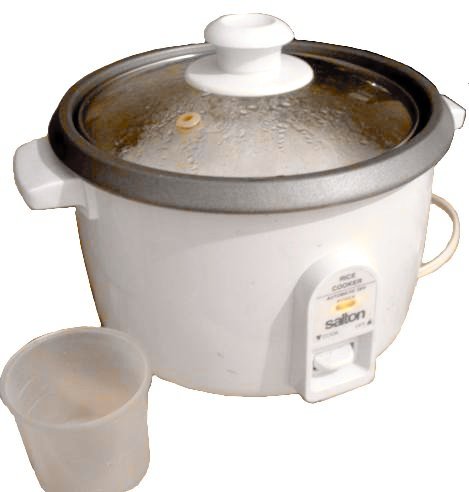 An electric rice cooker with its lid open