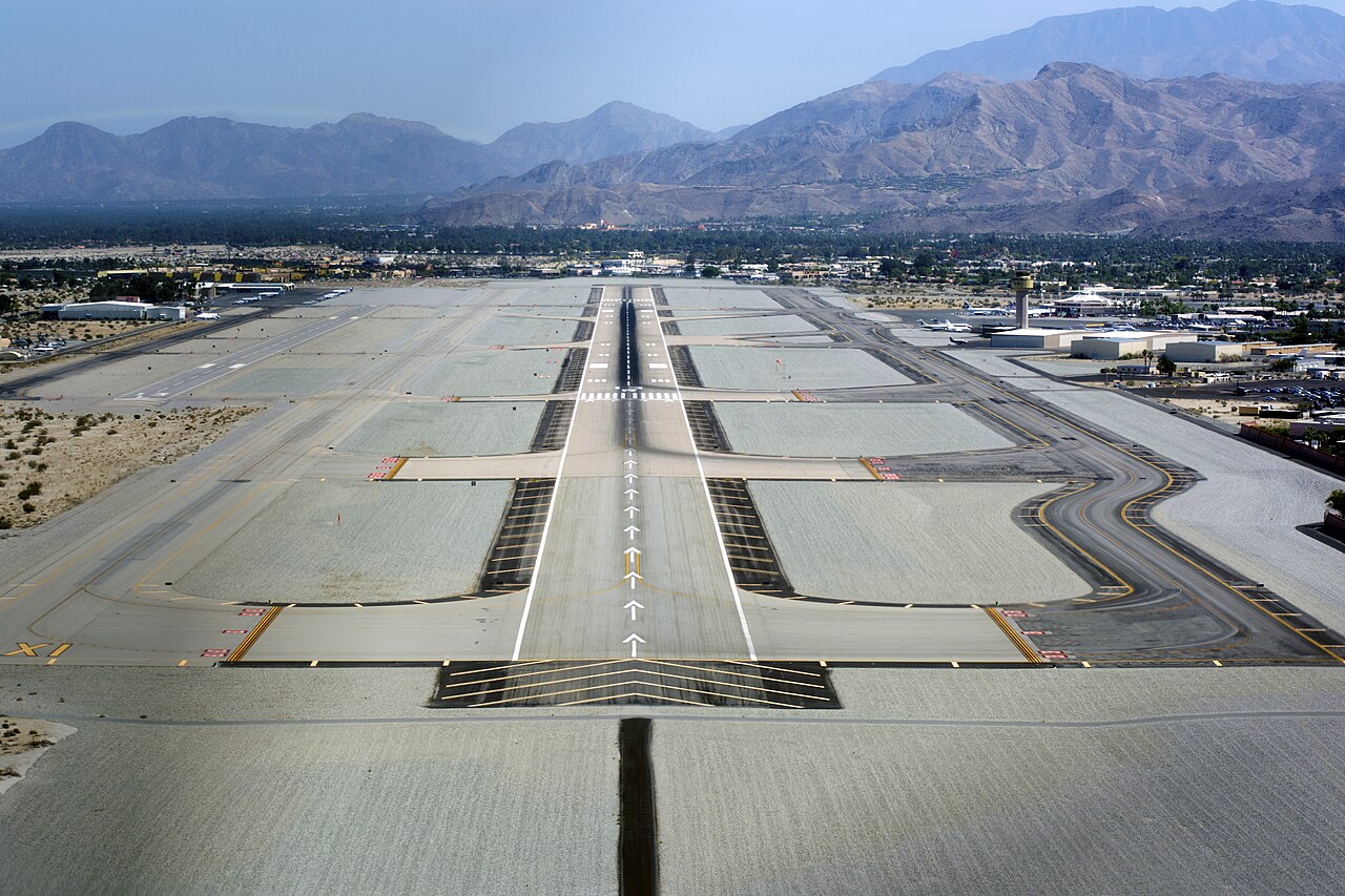 Aerial photograph of an airport with multiple runways visible