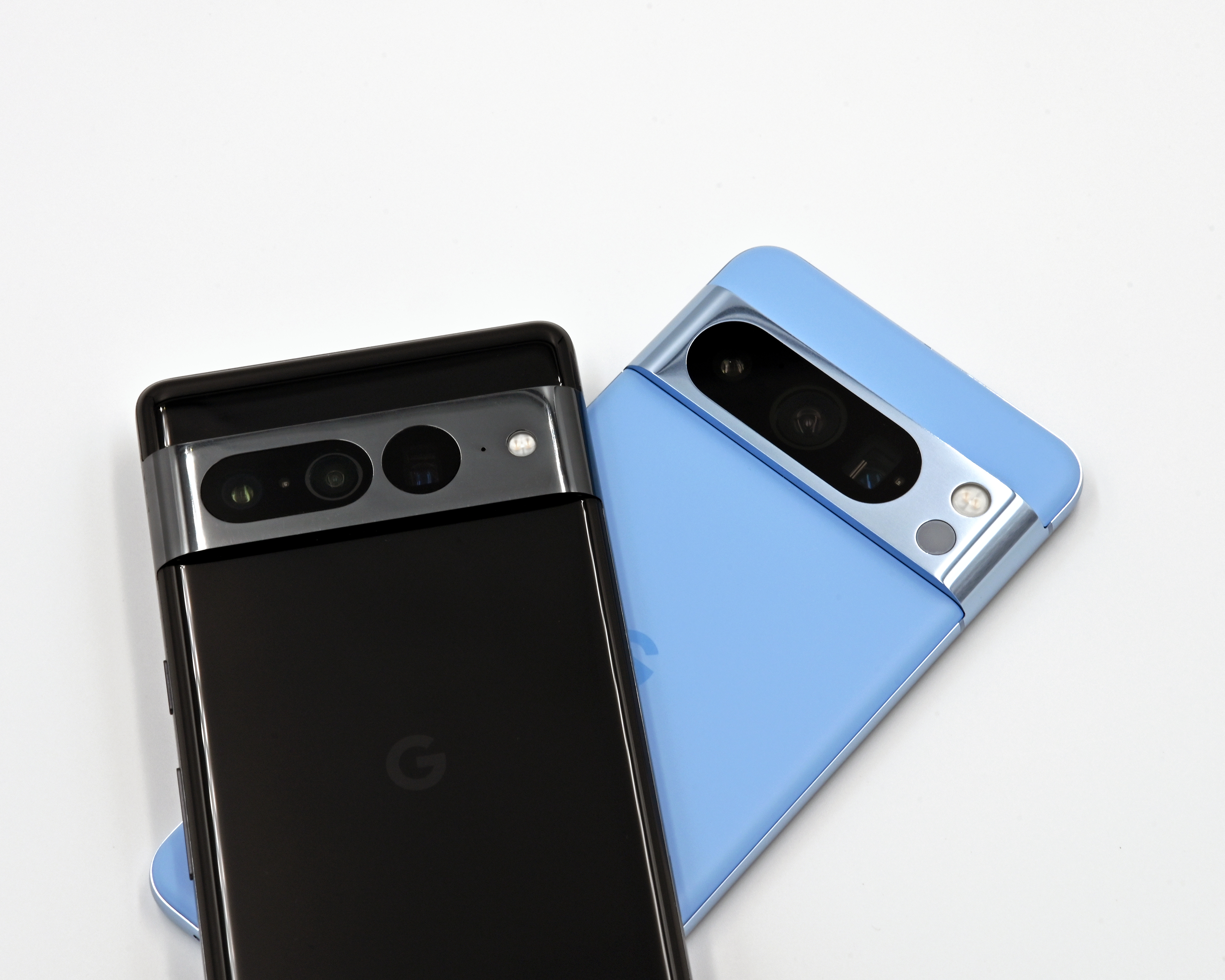 Two Google Pixel phones side by side, the kind of devices that store and sync Google passkeys