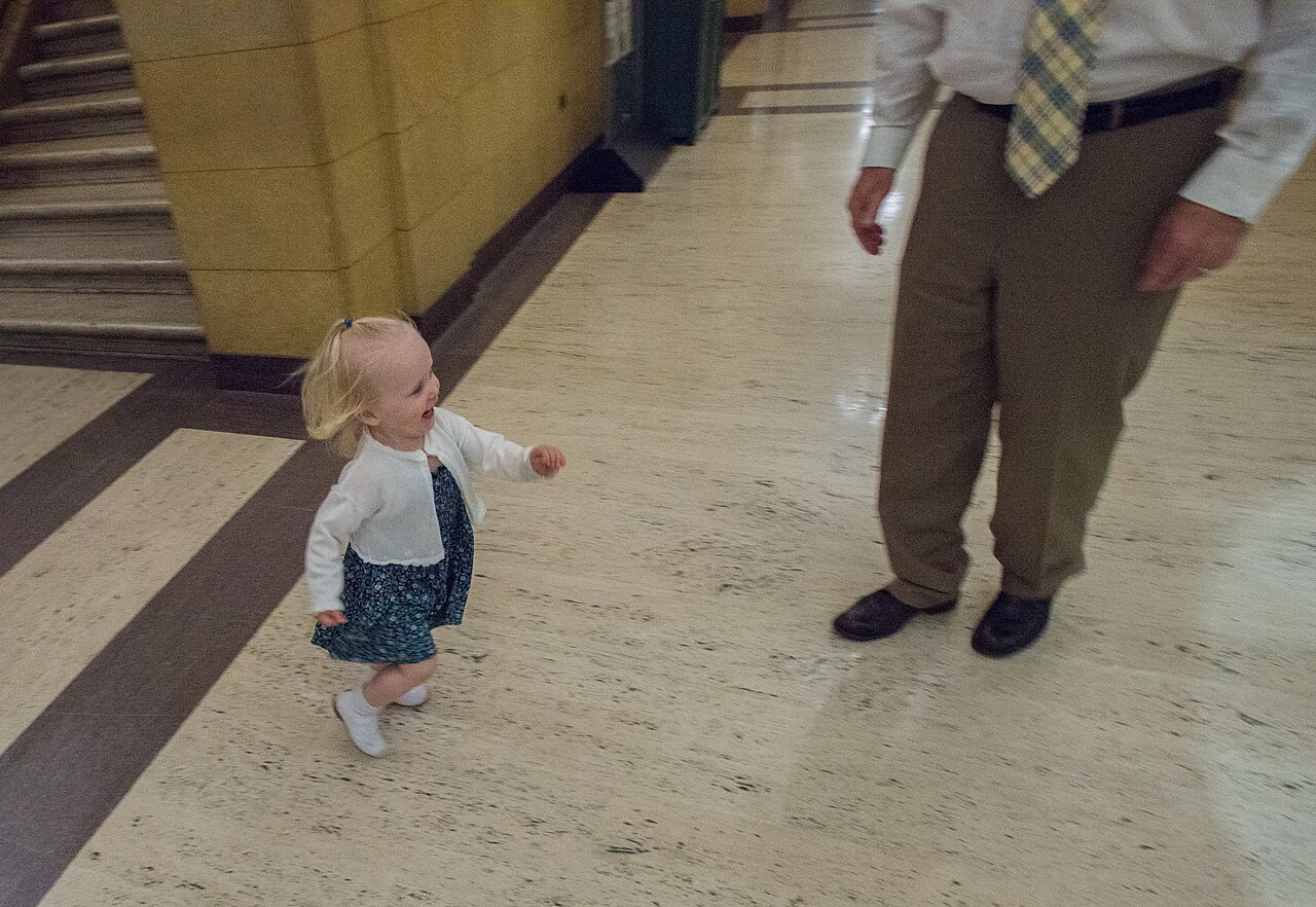 A toddler burns off energy during active play