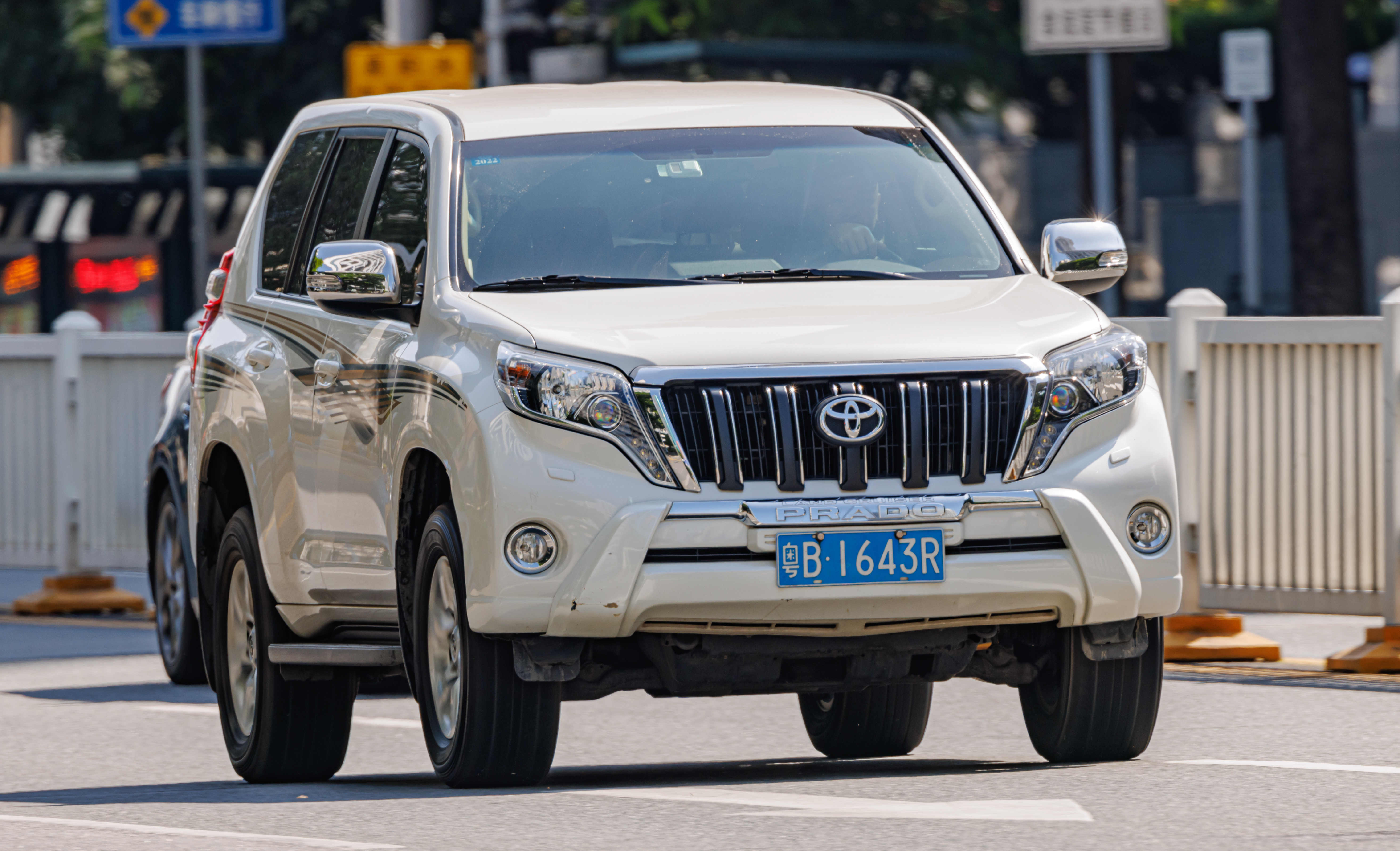 A Toyota LandCruiser Prado parked on a street