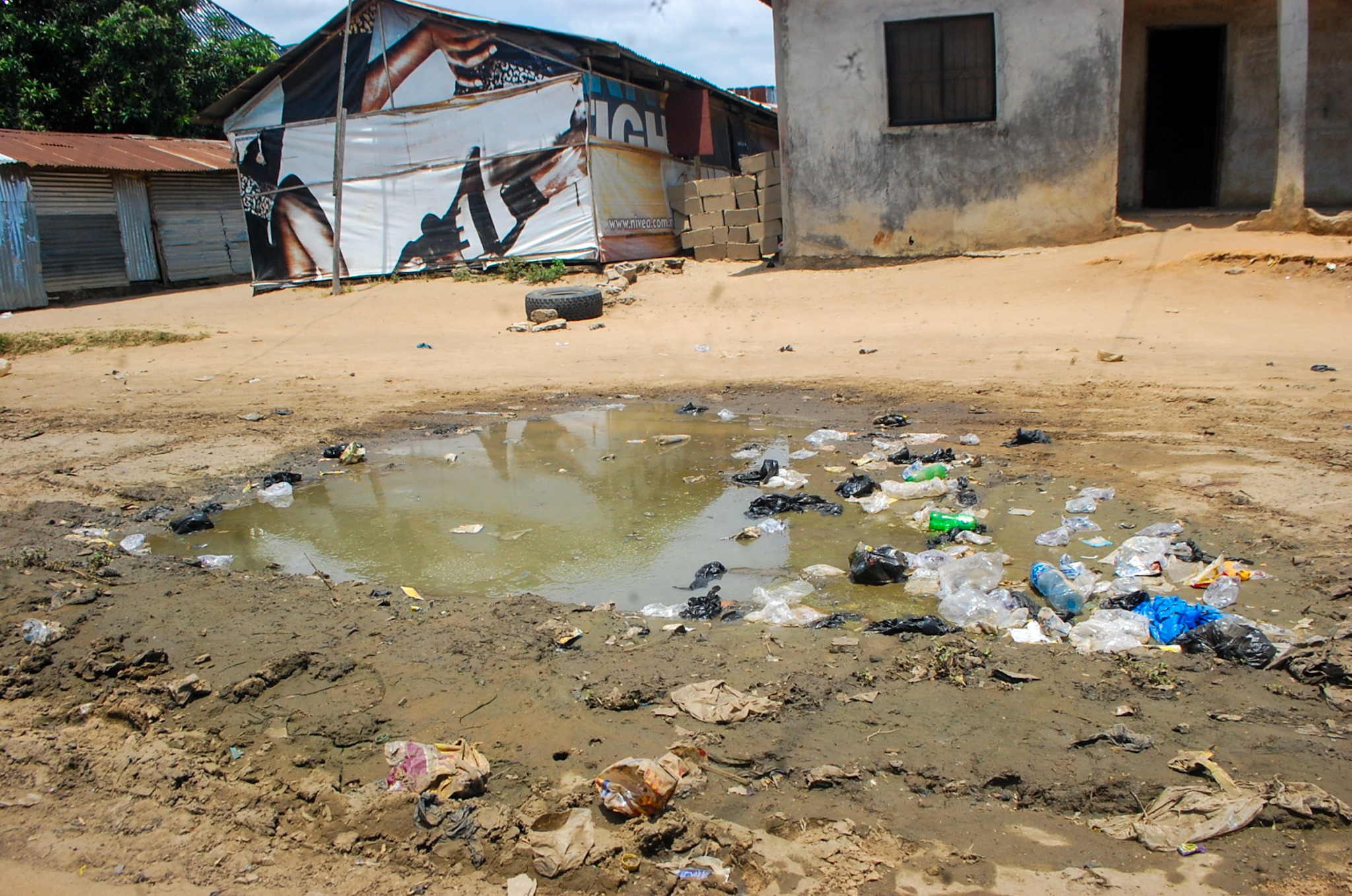 Standing water in a yard, where mosquitoes can breed