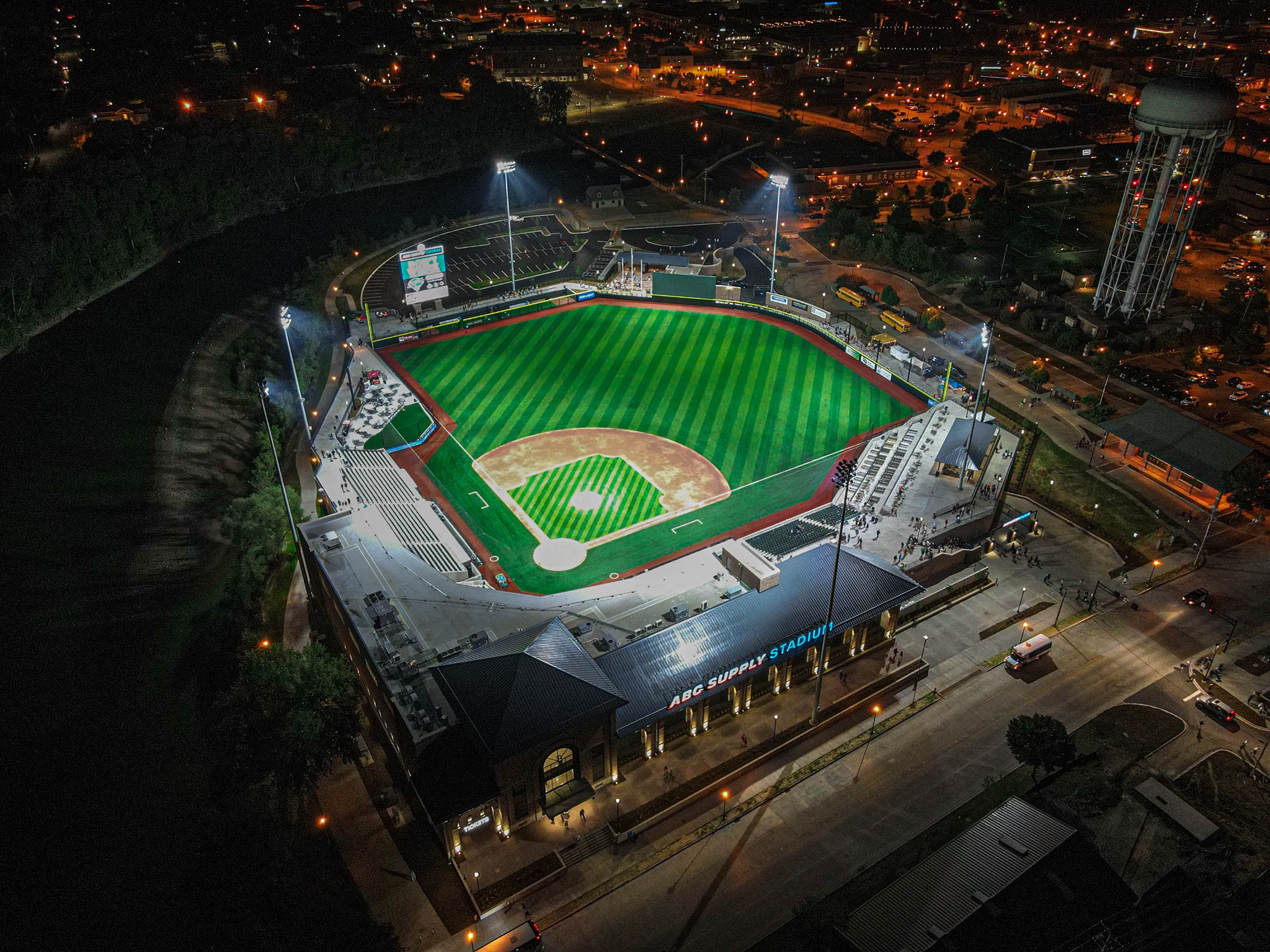 Baseball stadium at night under the lights