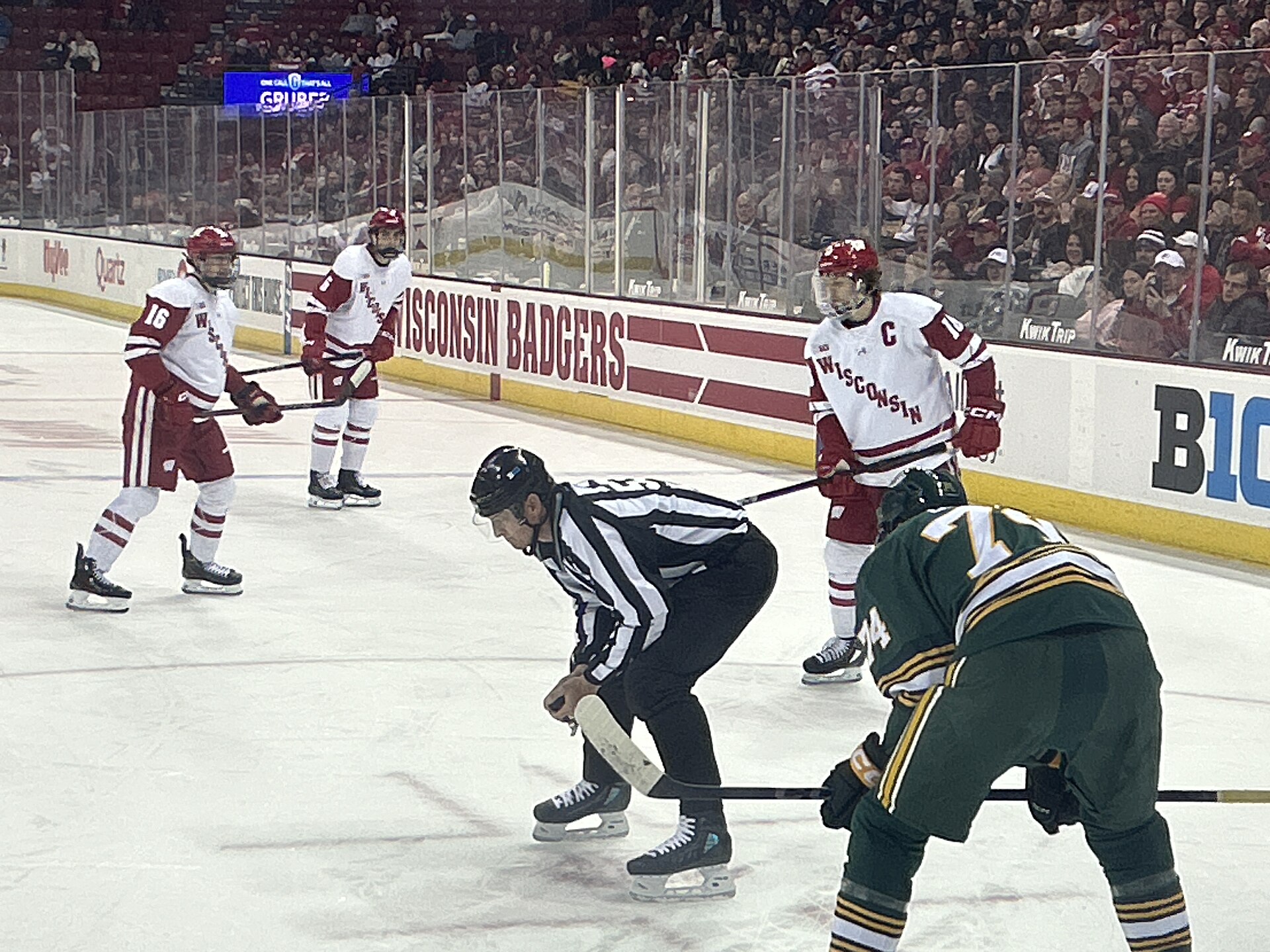 Ice hockey players skate during a game