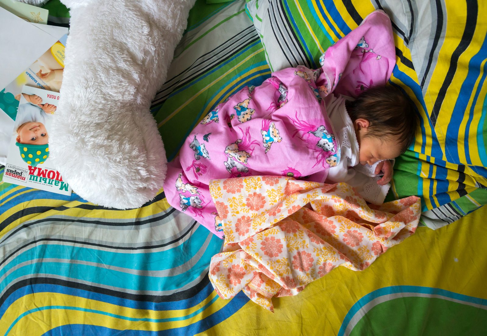 A sleeping baby resting with soft natural light